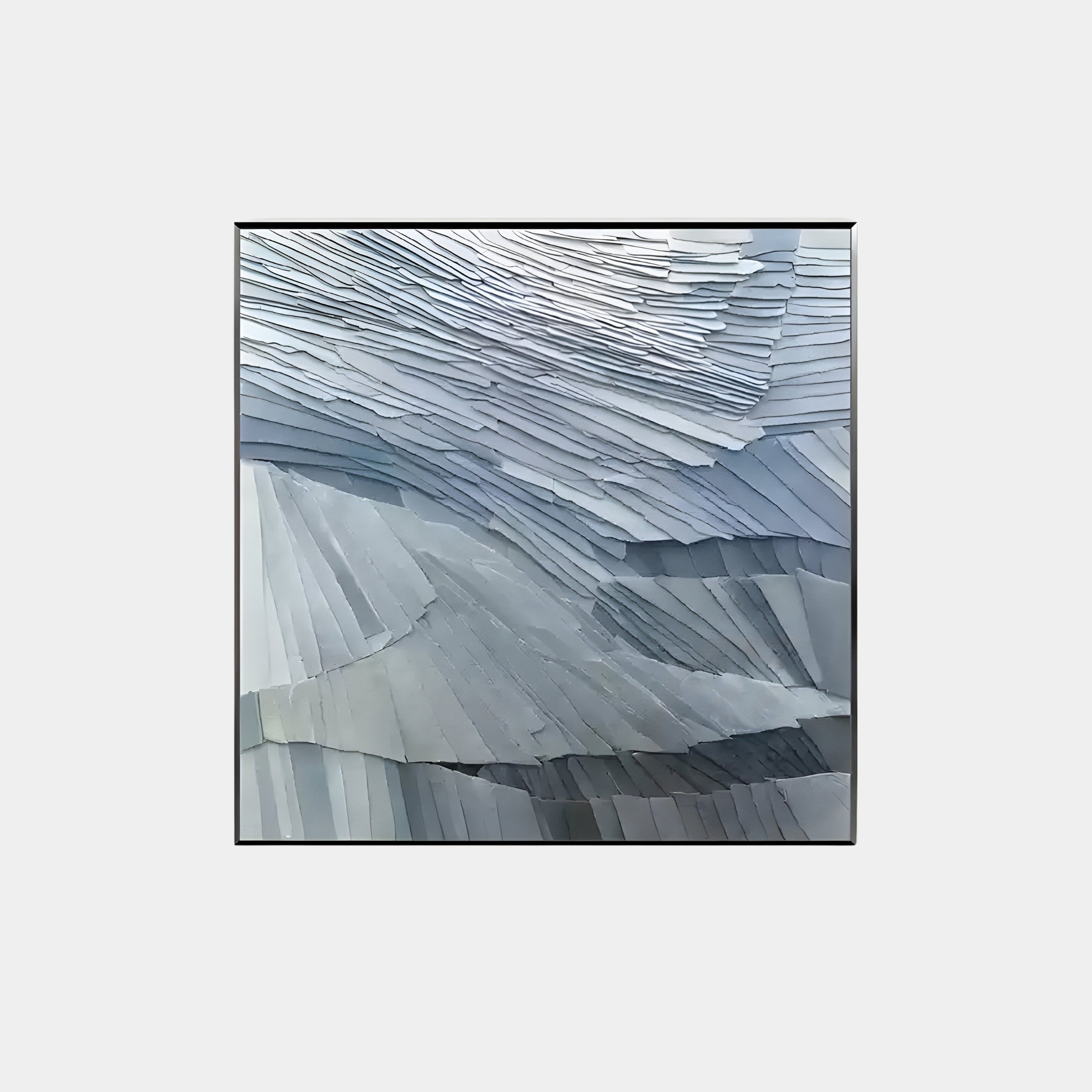 The Terrane Tranquil Blue Layered Abstract Wall Art by Giant Sculptures showcases rectangular shapes in gray and white, accented with tranquil blue, creating a wave-like pattern. It embodies modern Wabi-sabi style with its imperfect elegance within a square frame.