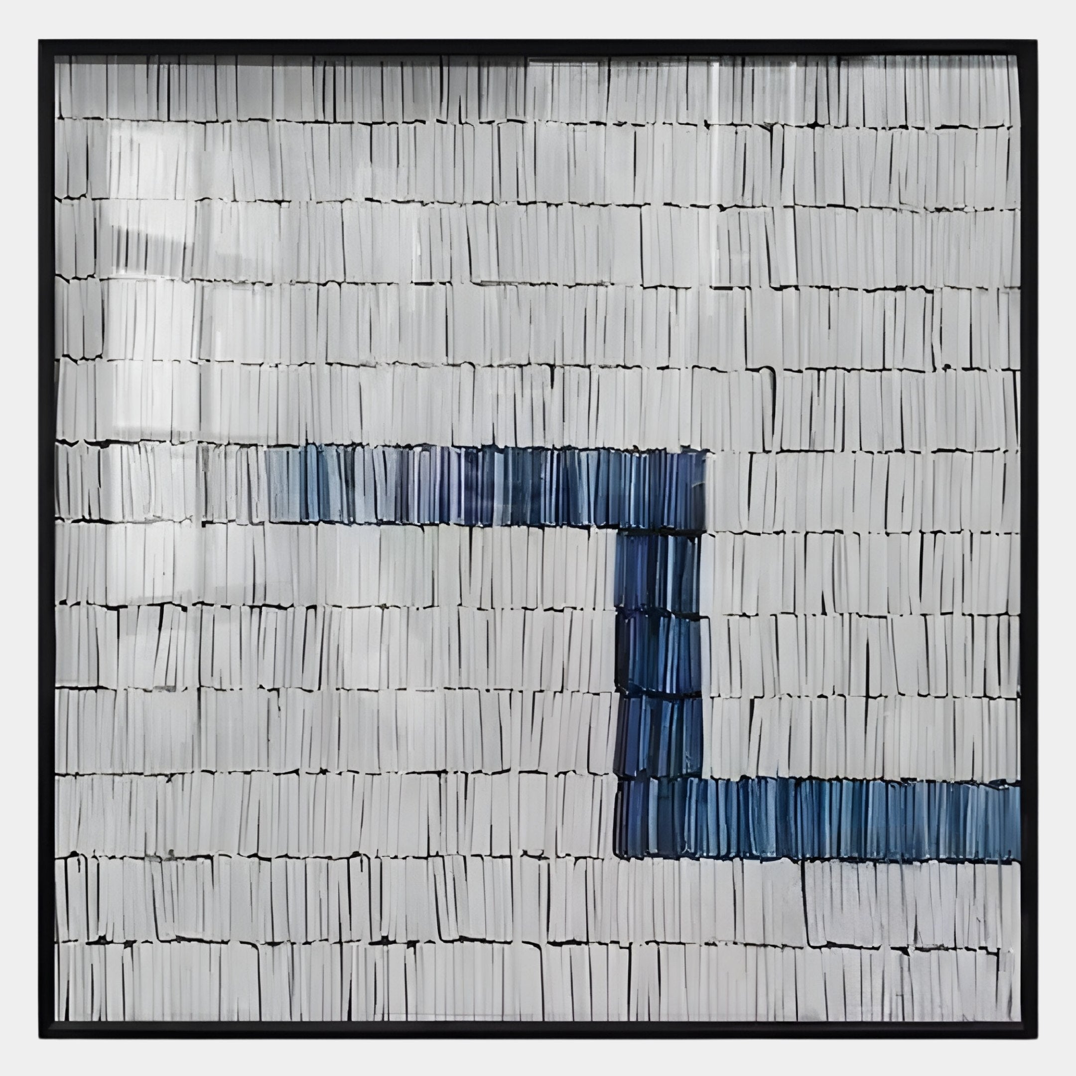 Tracery I Blue & White Textured Paper Wall Art by Giant Sculptures features minimalist, geometric rows of white rectangles with bold dark blue right angles in a sleek black frame.