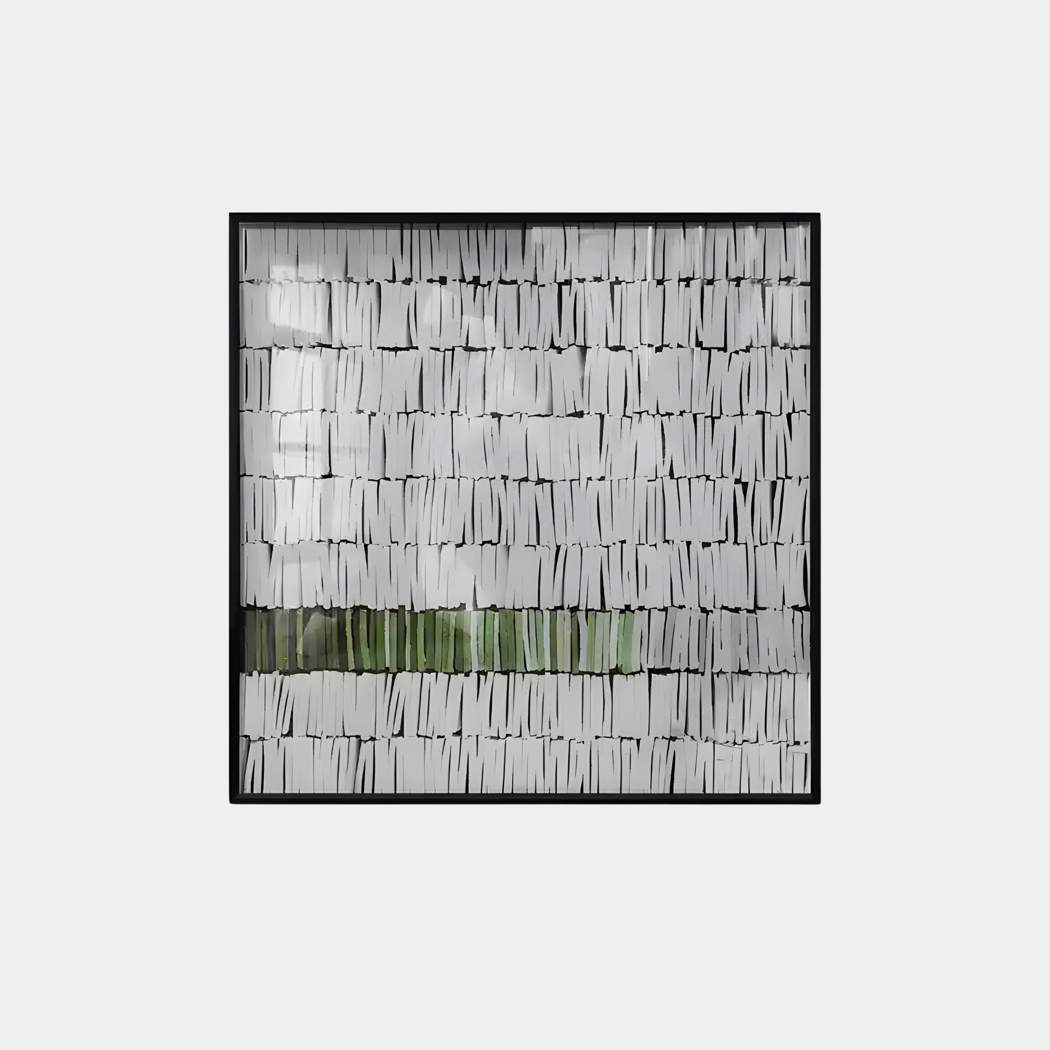 The Tracery III Green & White Textured Paper Wall Art by Giant Sculptures showcases contemporary craftsmanship with layered white strips forming a textured surface. A central horizontal band of green strips provides contrast, while the black frame complements minimalist interiors.