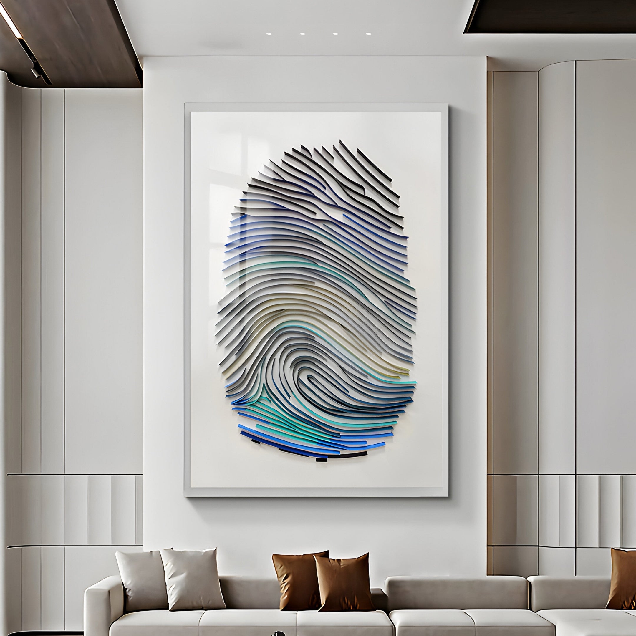 The Imprint Multi-Coloured Fingerprint Personalised Abstract Wall Art by Giant Sculptures is a modern centerpiece with layered, wave-like patterns in blue, gray, and white. It enhances a chic living rooms white wall above a sofa adorned with white and brown cushions.