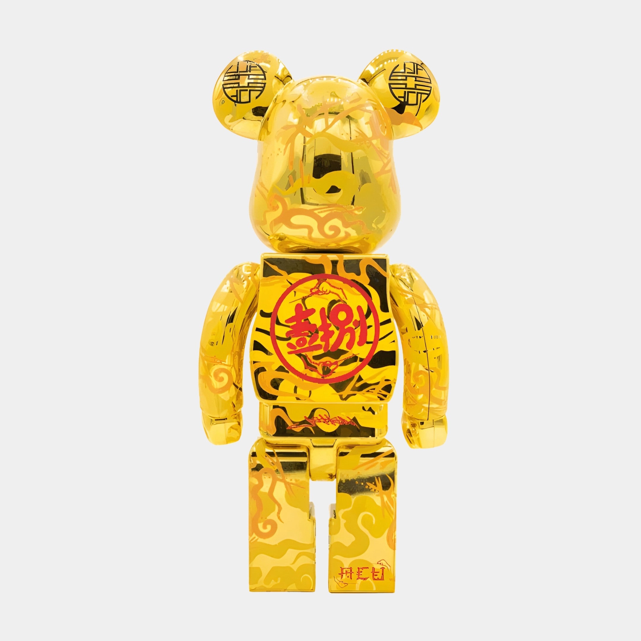 The Chinese Charm Gold Bear Sculpture - 70cm by Giant Sculptures stands upright against a white background, featuring shiny gold finish with red and black Chinese characters, stylized clouds, and Good Fortune symbols.