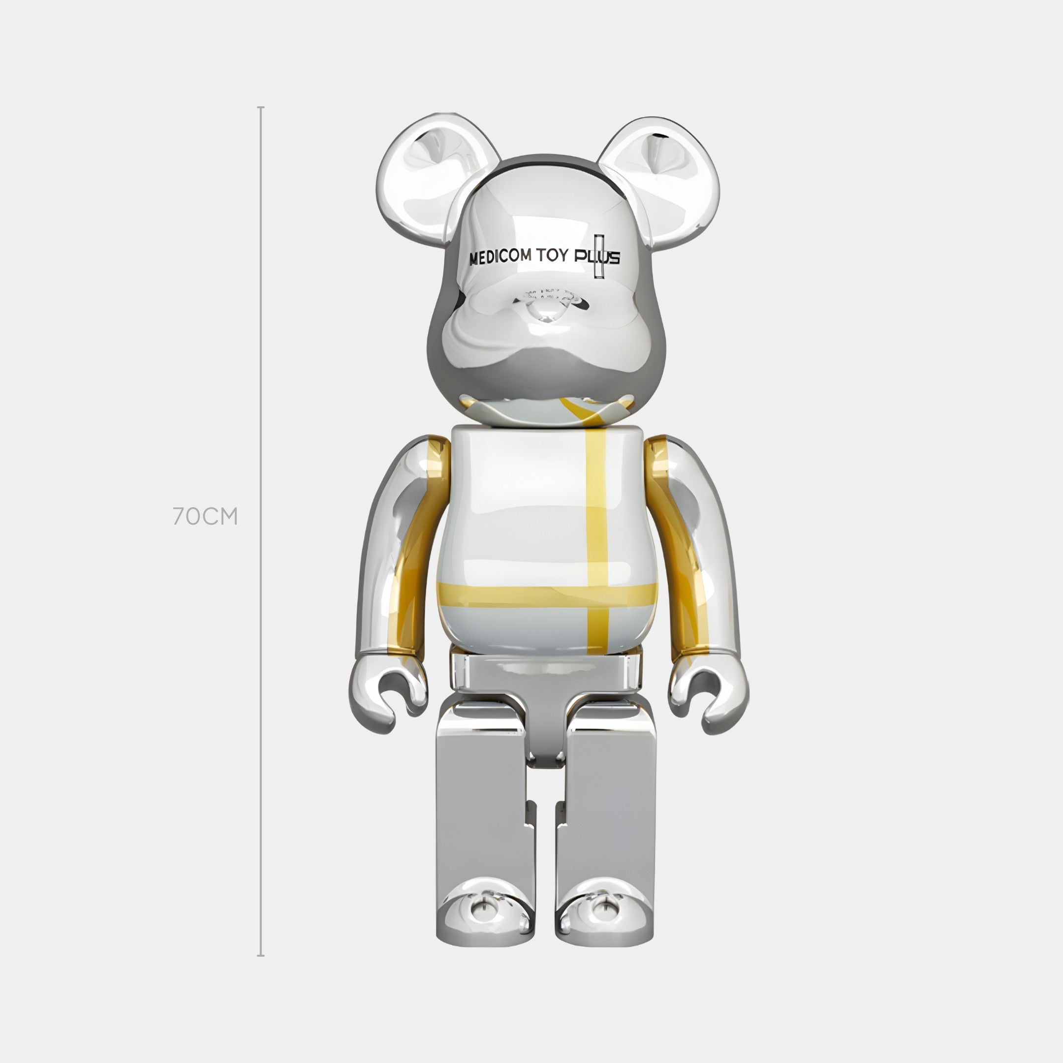 The Atelier Chrome Grid Bear Sculpture by Giant Sculptures stands 70 cm tall, featuring a shiny chrome finish with silver and yellow accents—an eye-catching piece of pop-art décor.