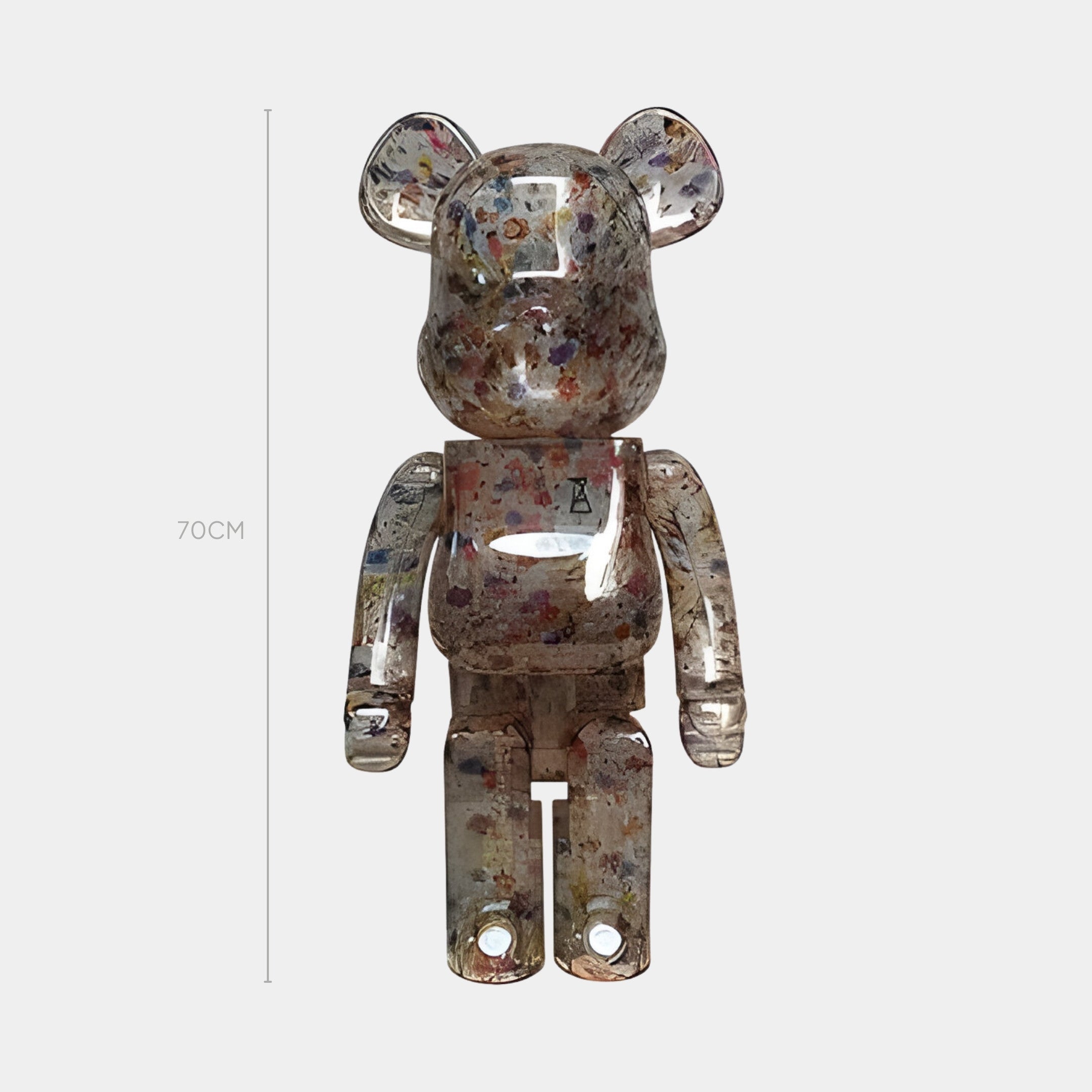 The Clear Paint Fleck Bear Sculpture - 70cm by Giant Sculptures stands upright against a plain background, its floral pattern and multicoloured flecks visible. A vertical line beside it indicates its 70 cm height.