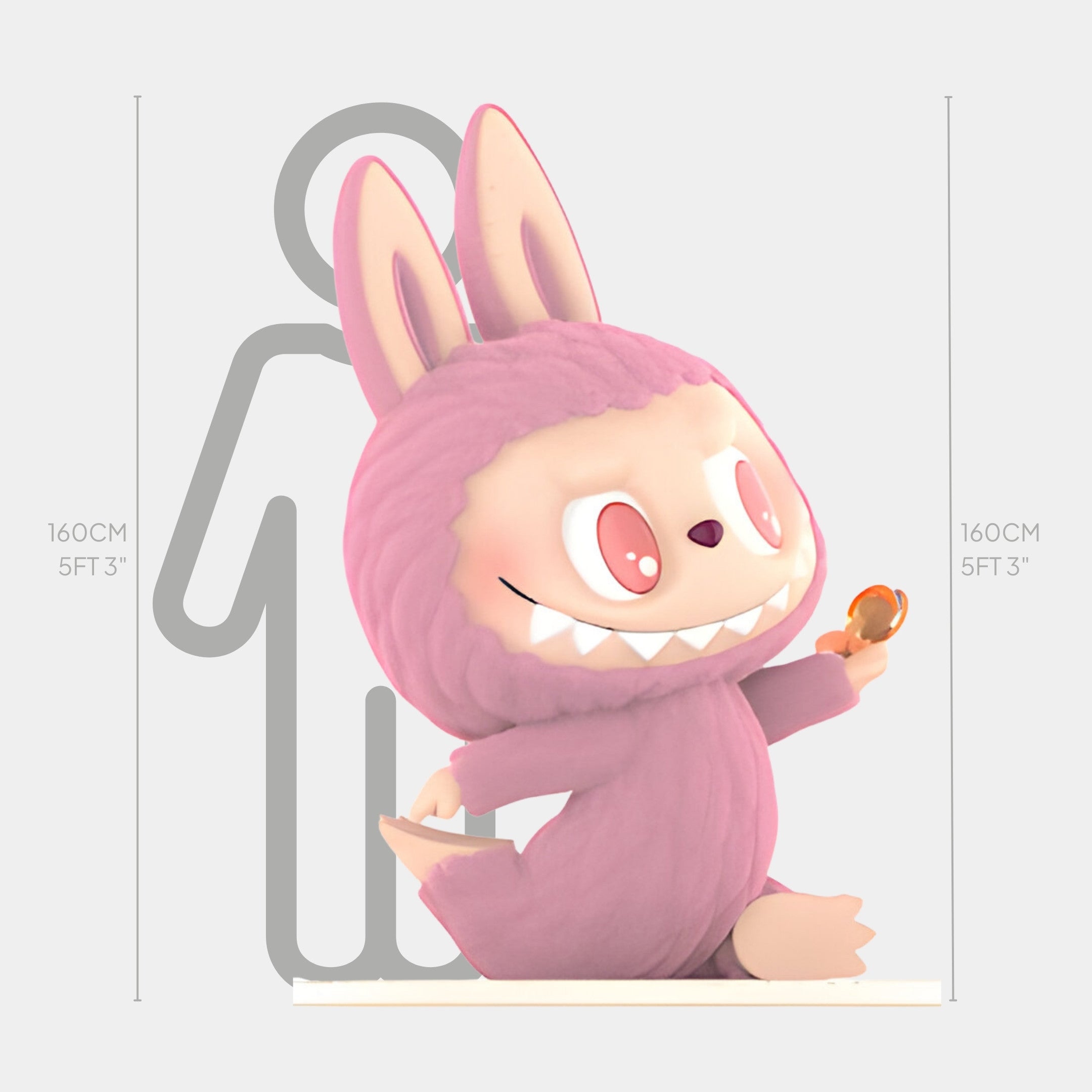 The Giant Sculptures Lazy Yoga Confident Labubu Sculpture - 160cm is a large pink, rabbit-like figure with big eyes, sharp teeth, and a lollipop, shown beside a human outline to highlight its matching height. Suitable for indoor display.
