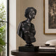 Classical African Woman Bronze Bust, 70cm, by Giant Sculptures, shown in black cast bronze on a dark pedestal atop a console table in a living room setting.