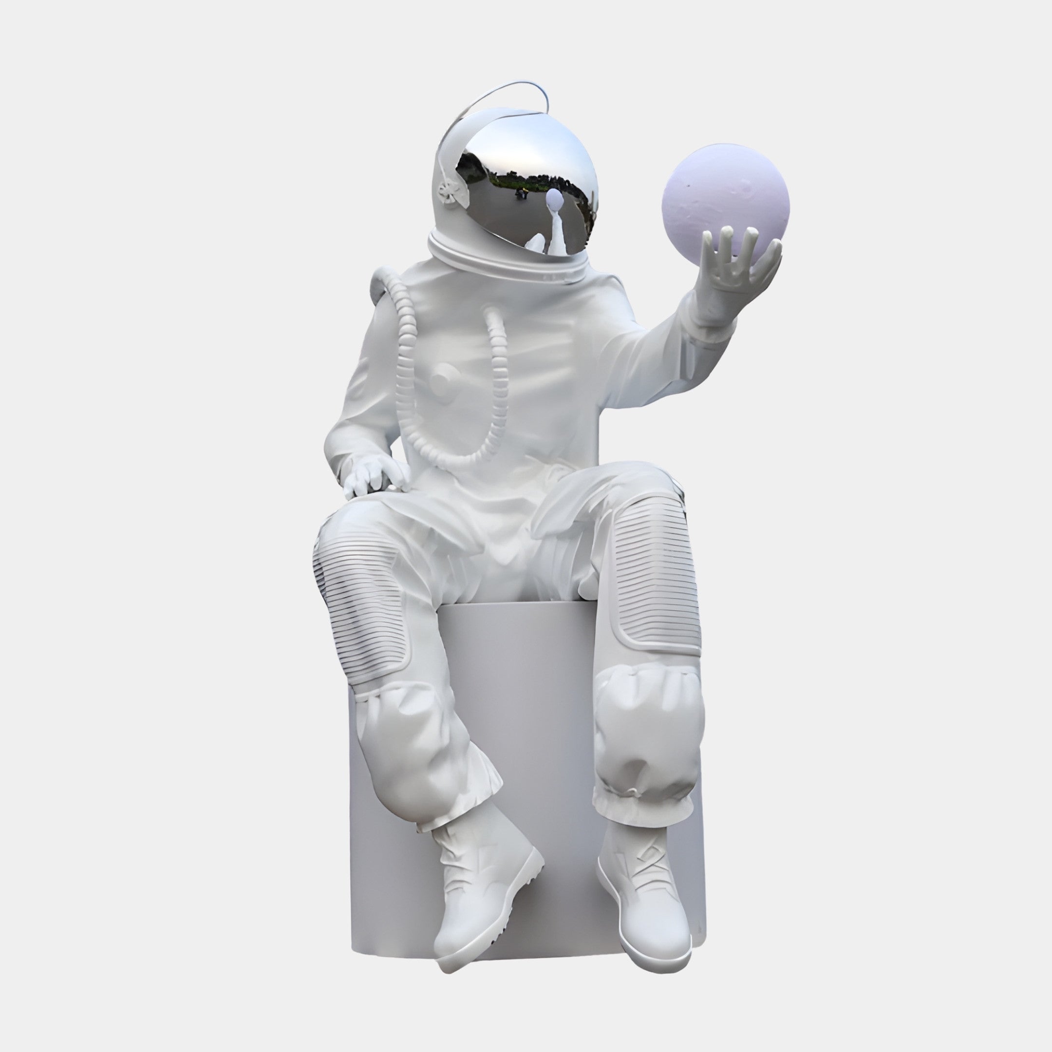 Giant Sculptures 140cm White Astronaut with Purple Balloon Sculpture seated on a plinth, mirrored chrome visor, holding a lilac orb against a plain background.