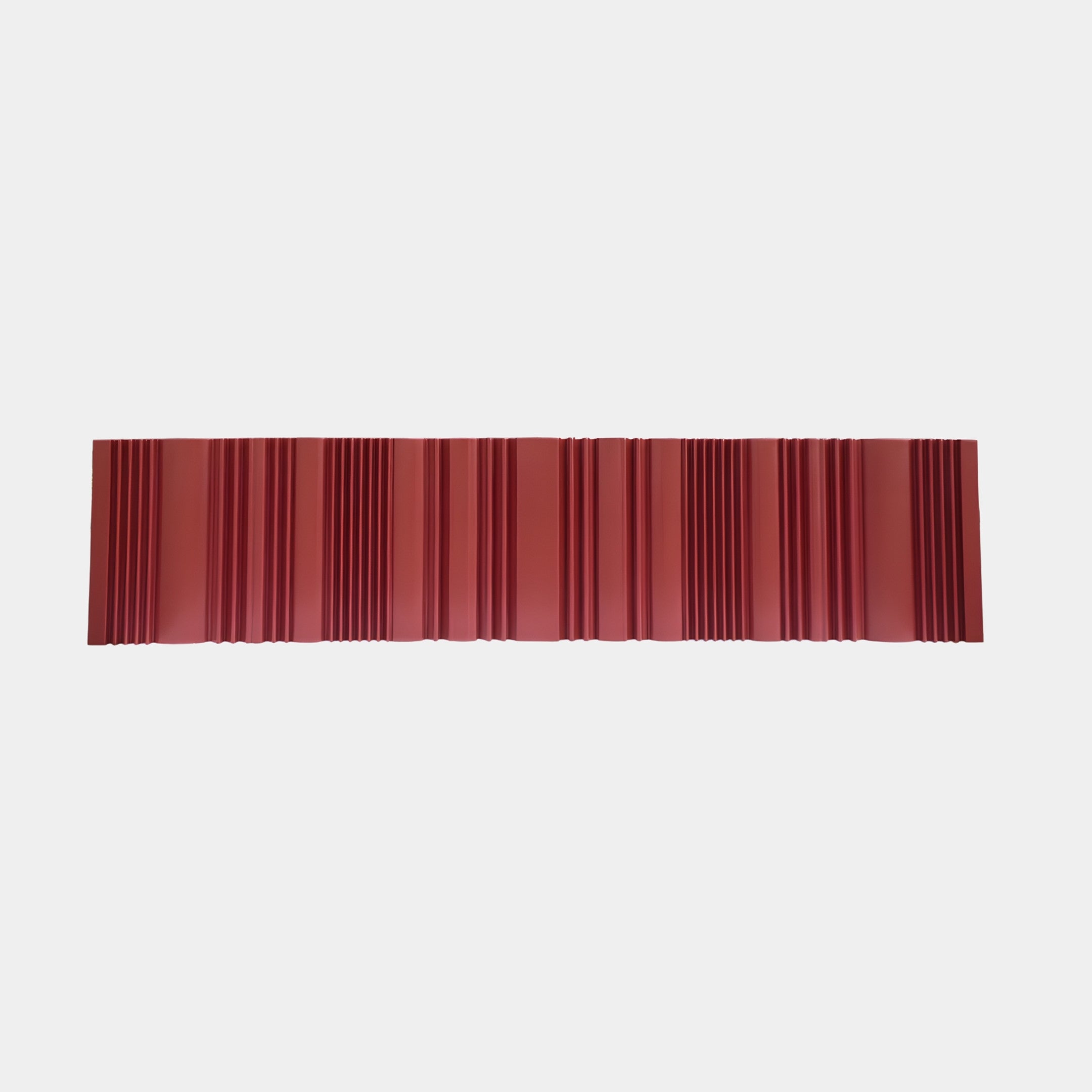 Red Ribbed Planter Trough by Giant Sculptures, a long 220cm 3D-printed resin trough with a deep red fluted surface, shown on a plain light background.