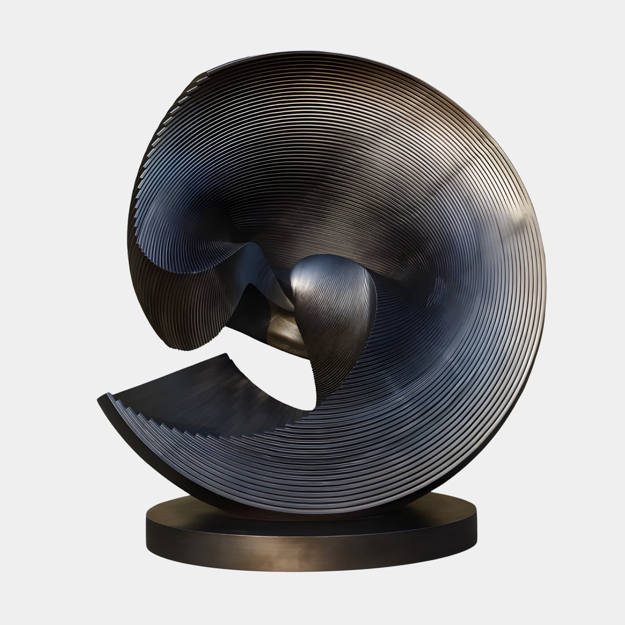 Bronze Spiral Vortex Disc Sculpture by Giant Sculptures, a 208cm ridged spiral disc curling inward to a deep vortex, on a round bronze base against white.