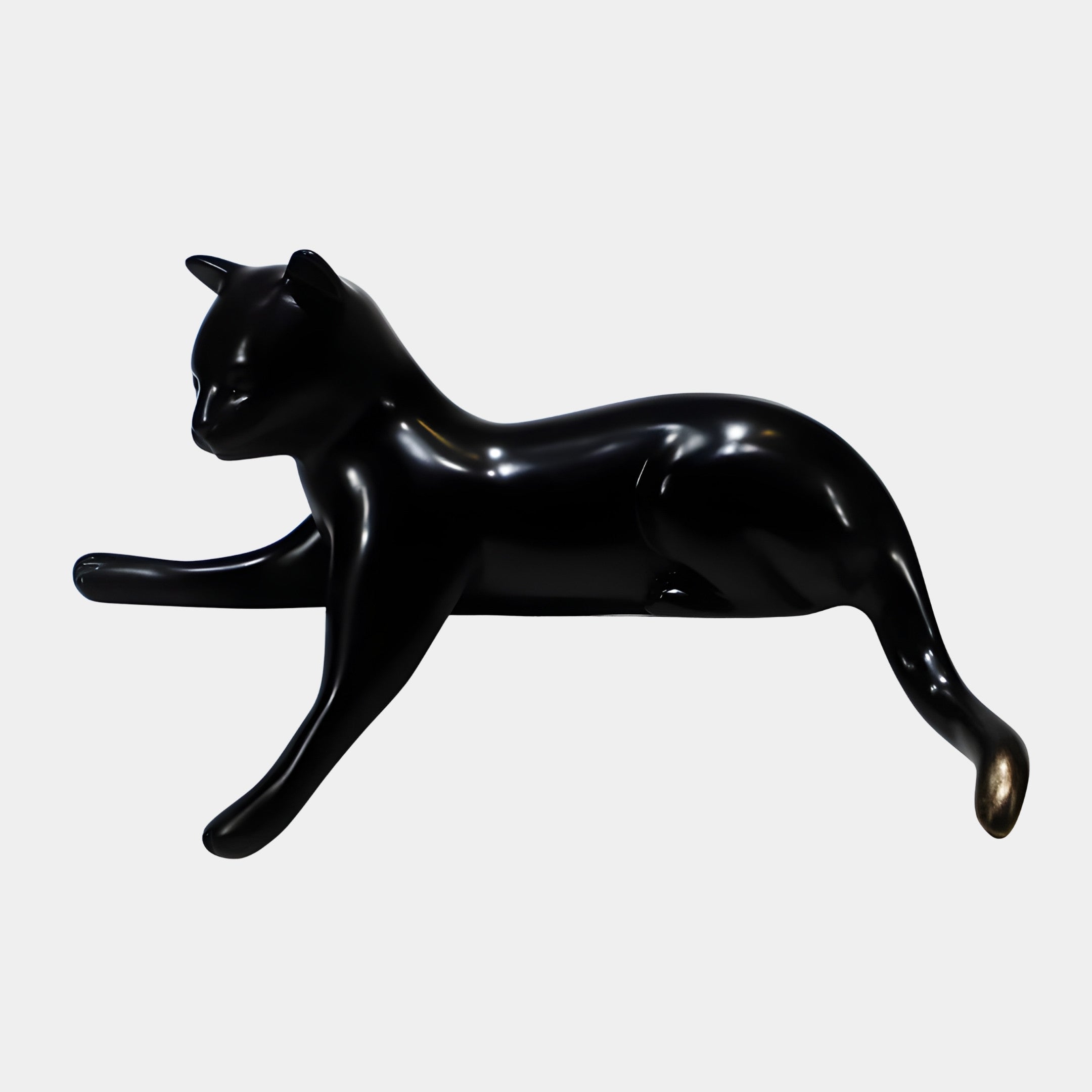 Giant Sculptures Black Sleek Reclining Cat Sculpture 50cm in glossy 3D-printed resin with a gold-tipped tail, shown in side profile on a plain light background.