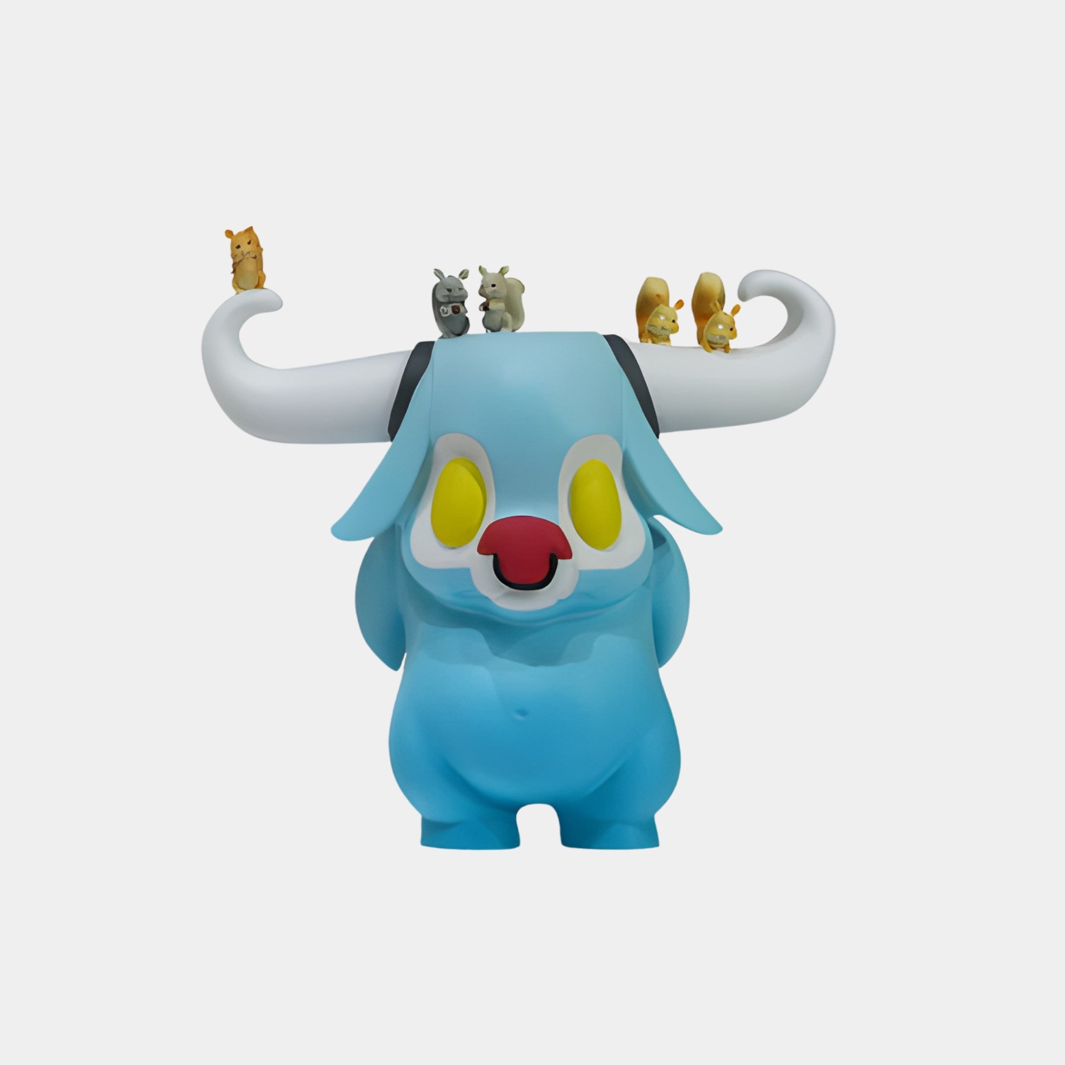 Giant Sculptures Blue Bull Monster with White Horns Sculpture 26cm in resin, with yellow eyes, red nose, and tiny animal figures perched along the horns.