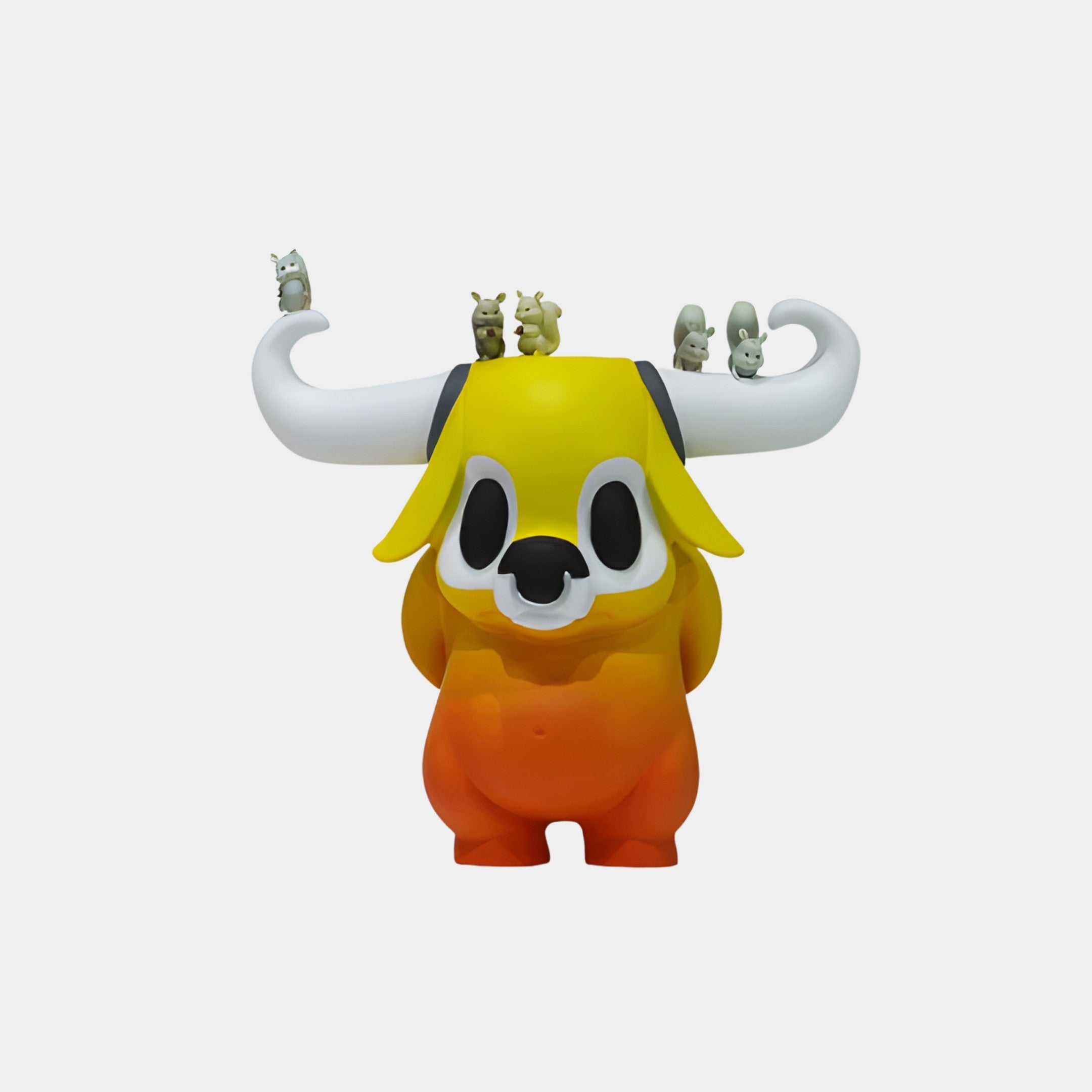 Giant Sculptures Yellow Bull Monster with White Horns Sculpture, 26cm resin figure with yellow-to-orange gradient and tiny baby bulls along the horns.