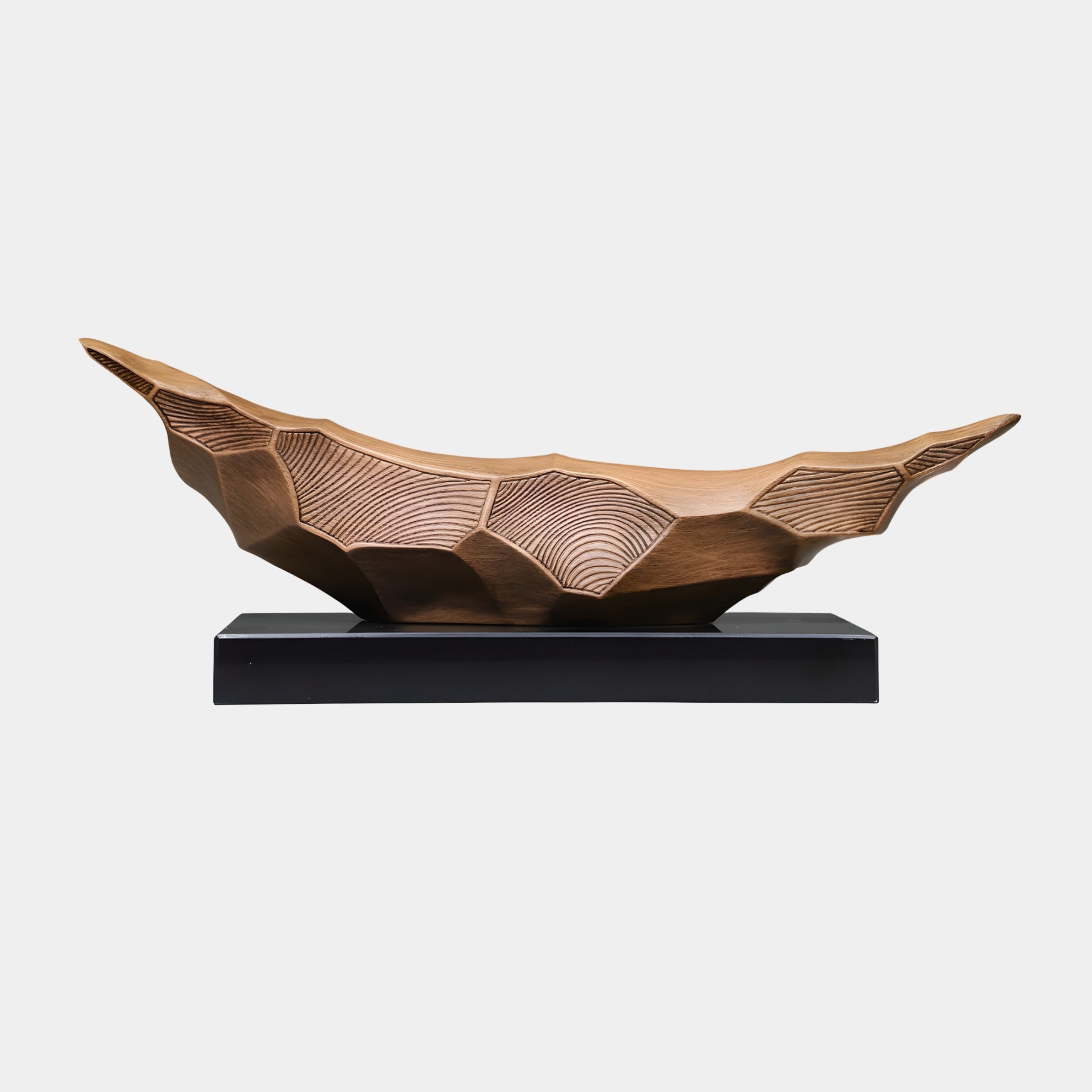 Brown Faceted Geometric Leaf Boat Bowl by Giant Sculptures, a 60cm 3D-printed resin piece with carved fan-grain panels and upswept ends on a black base.