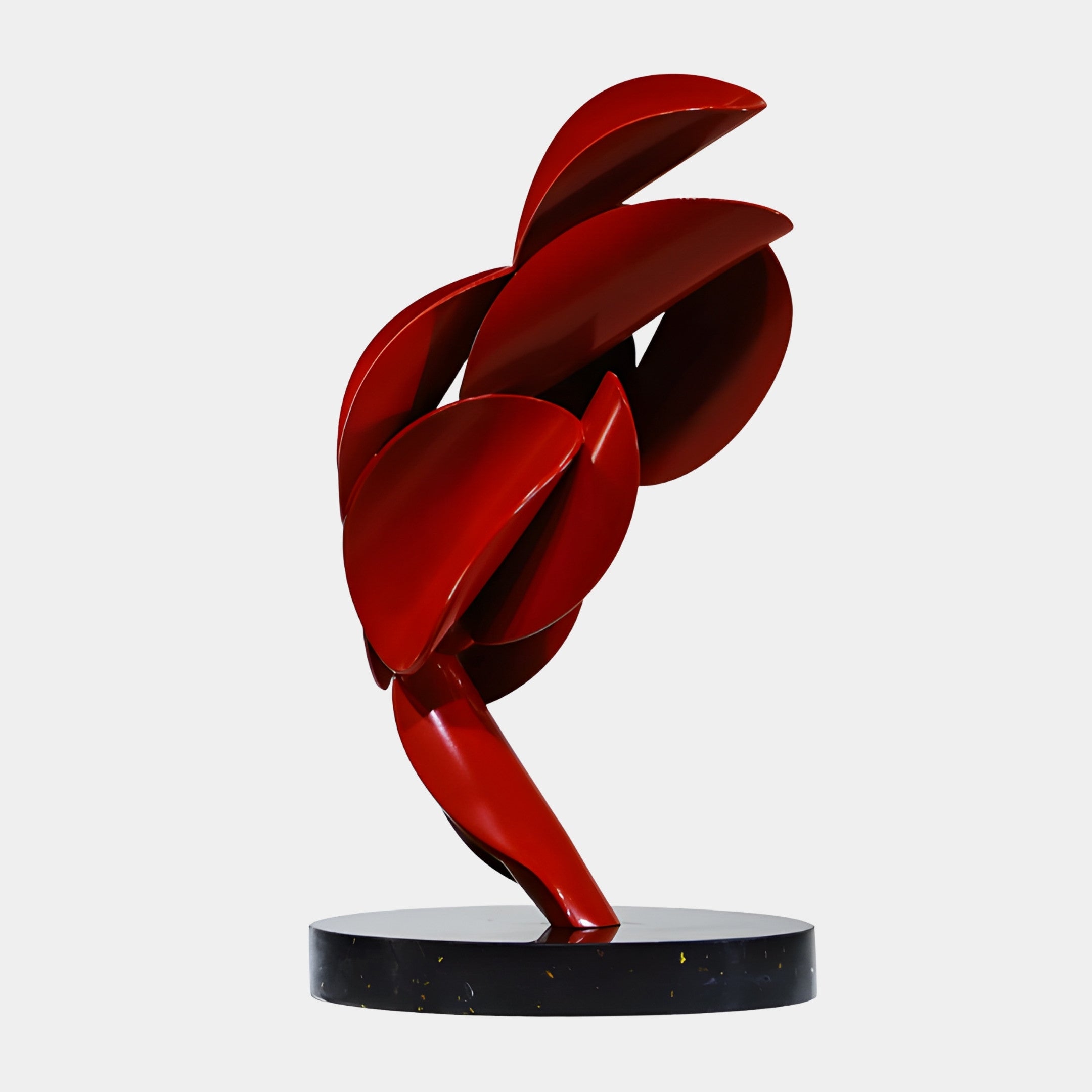 Red Abstract Stacked Petal Dancing Sculpture by Giant Sculptures in glossy 3D-printed resin, with overlapping curved blades on a round black base.