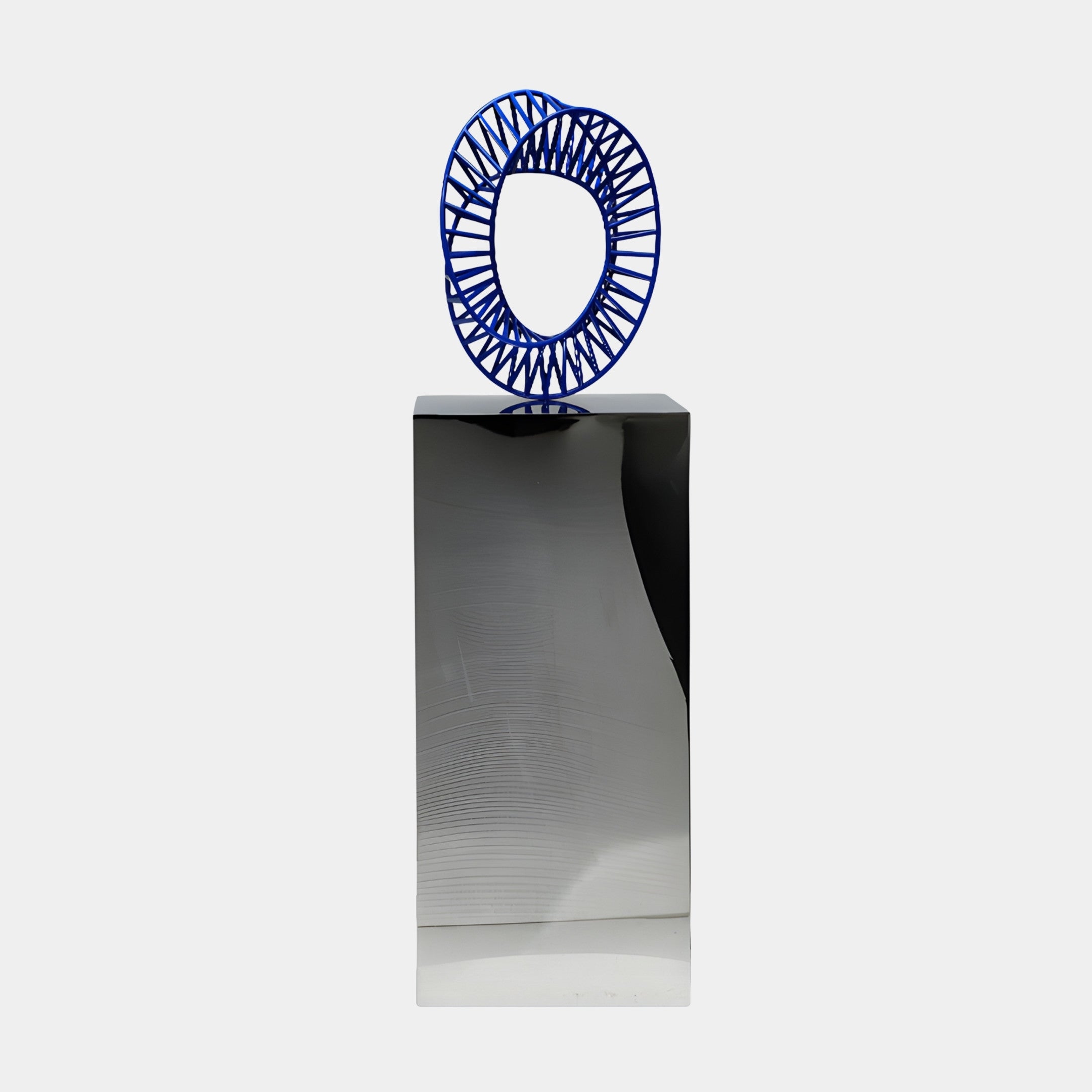 Blue Wire Abstract Oval Ring sculpture by Giant Sculptures, with radiating 3D-printed resin spokes framing an open centre atop a mirror-grey stainless steel plinth.