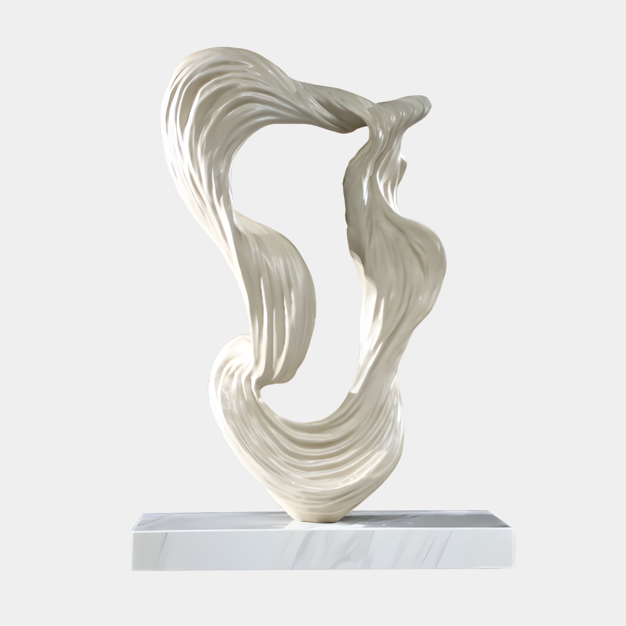 White Abstract Flowing Ribbon Loop Sculpture by Giant Sculptures, a 69cm ribbed creamy matte resin form looping into a knot on a white marble base.