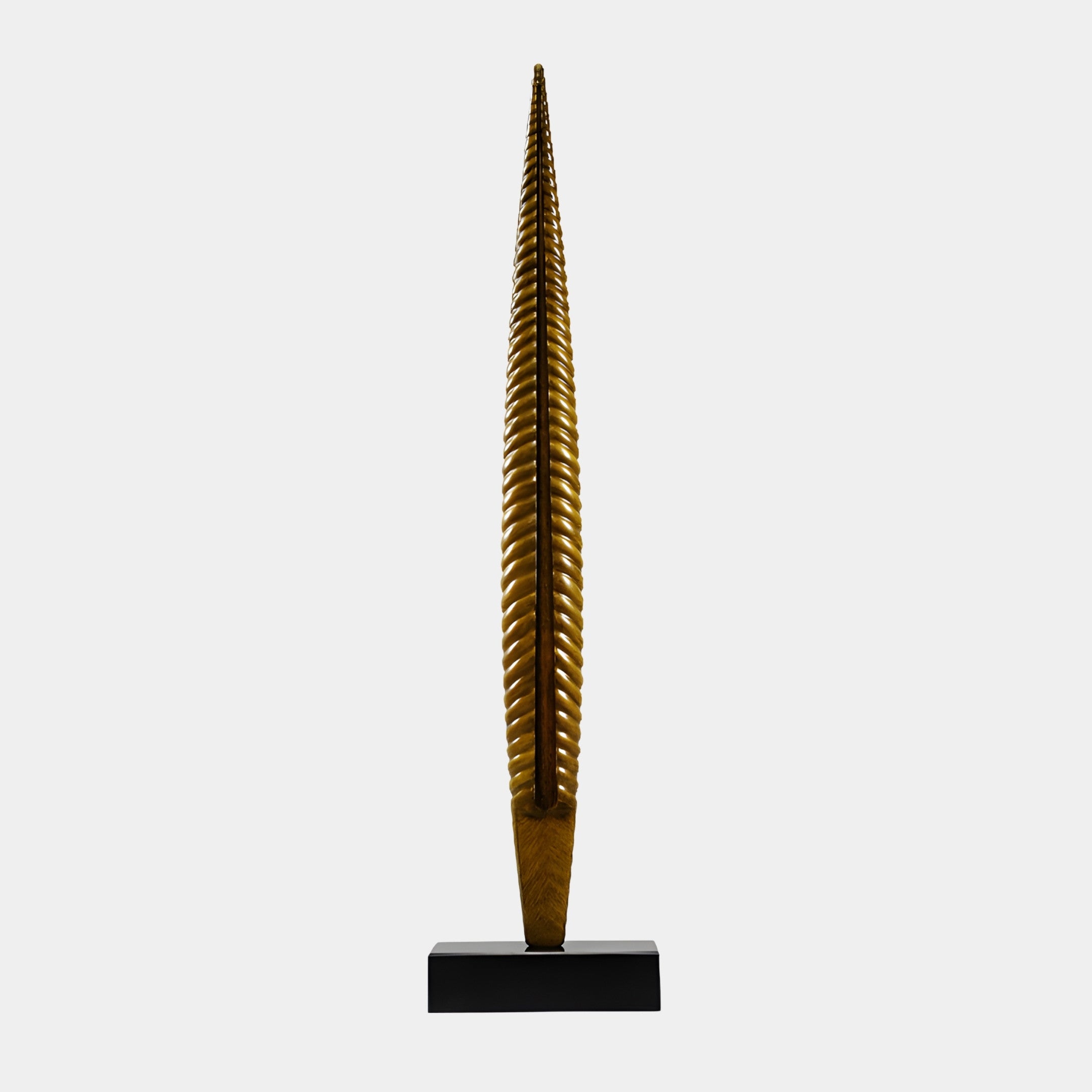 Gold Tall Feather Spear Sculpture by Giant Sculptures, a 106cm 3D-printed resin feather with ribbed herringbone detail and antique-gold finish on a black base.