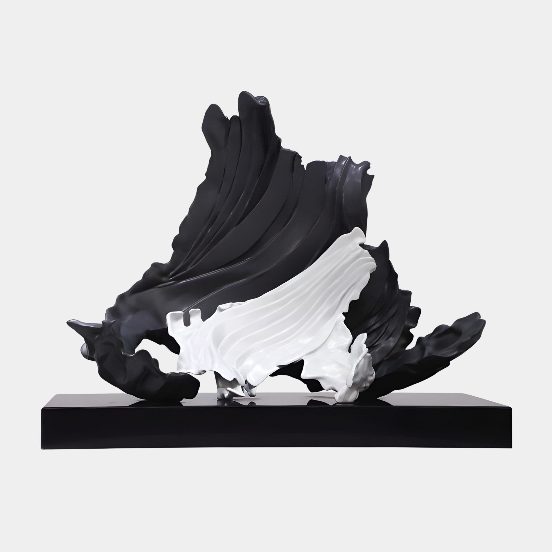 Black and White Abstract Wave Form Sculpture by Giant Sculptures, featuring a glossy black cresting wave over a white burst on a black marble base.
