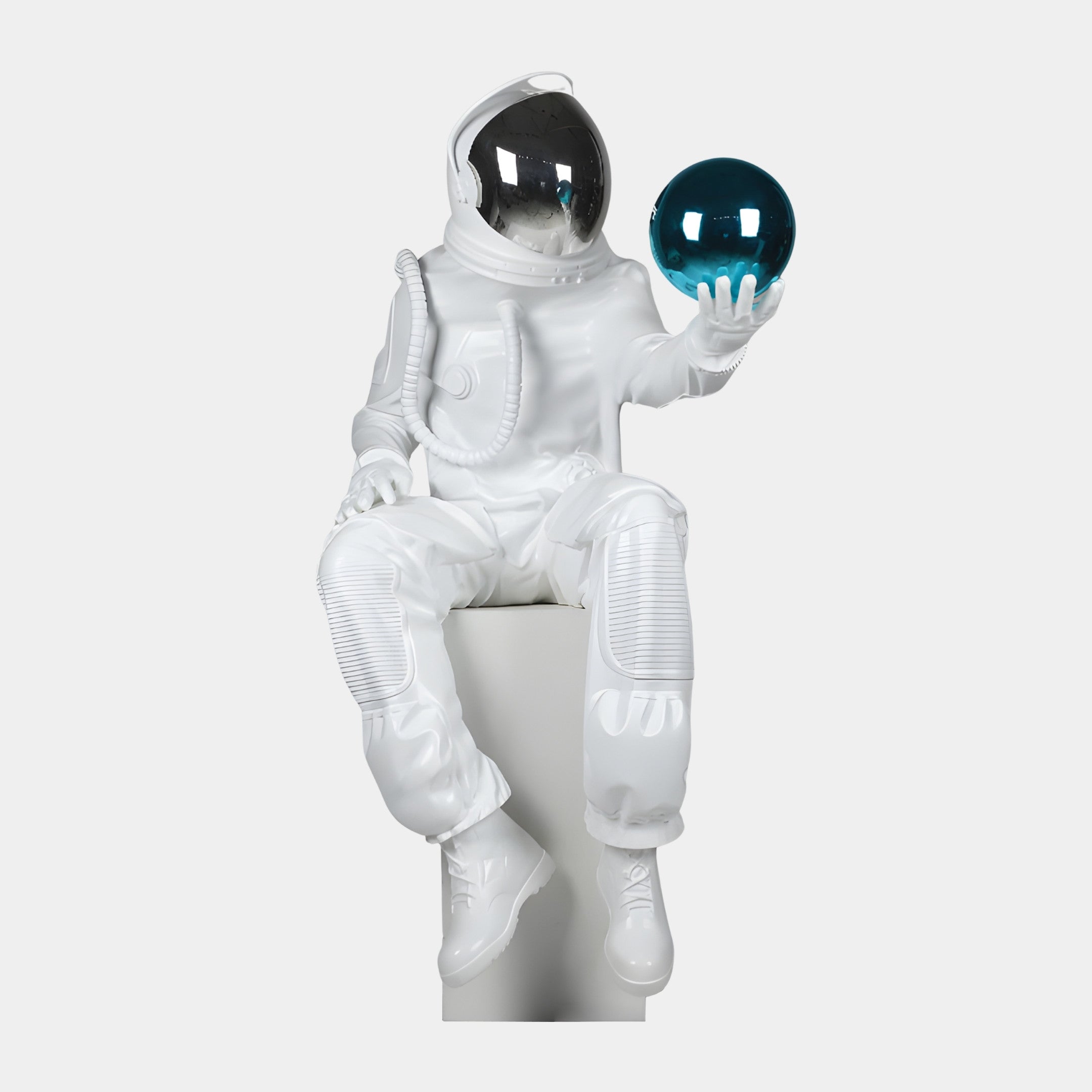 Giant Sculptures White Astronaut Seated with Blue Sphere Sculpture 130cm in glossy white resin with chrome visor, holding a teal sphere, on a plain background.