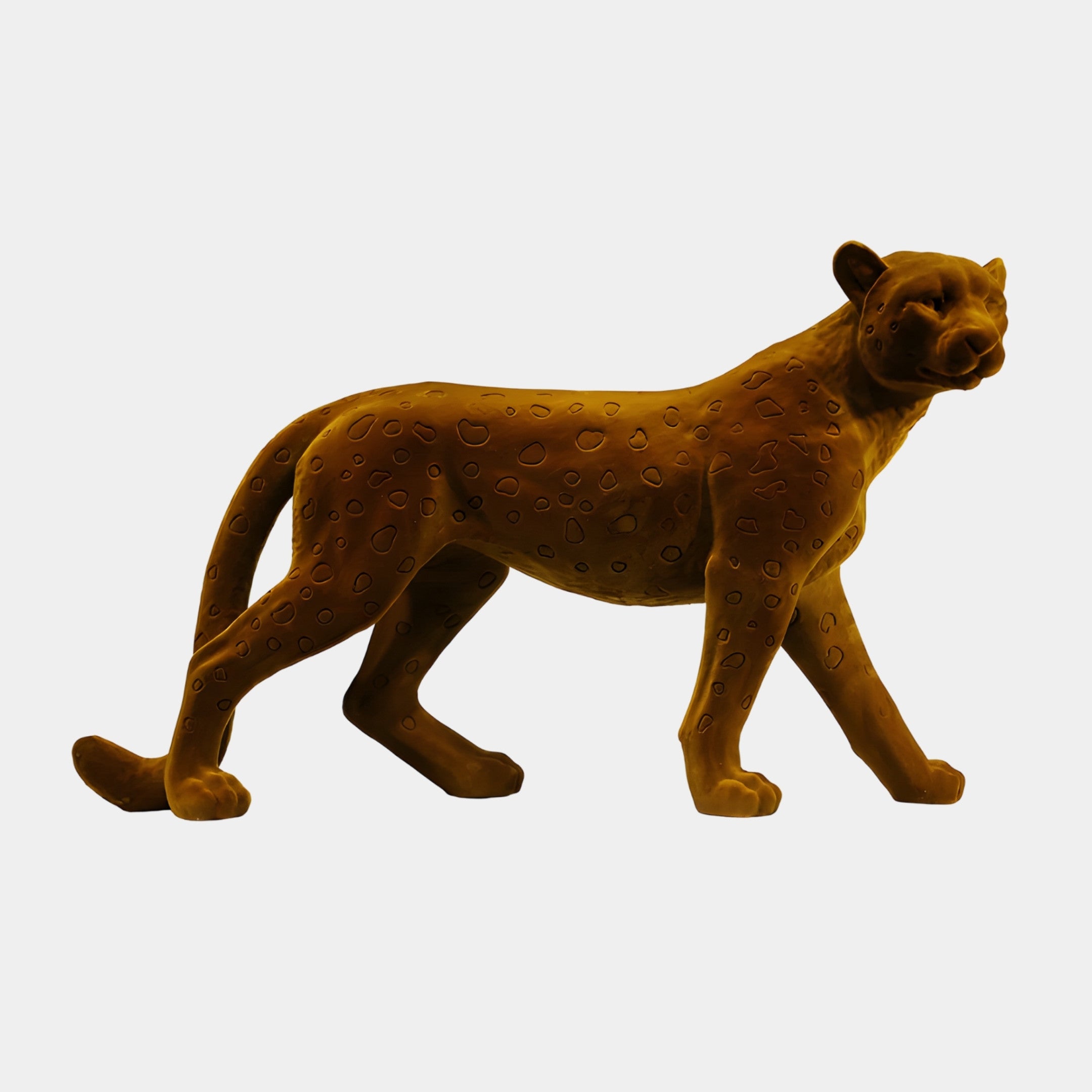 Brown Flocked Standing Cheetah Sculpture by Giant Sculptures, shown mid-stride in side profile with sculpted spots and a suede-like finish on a plain background.