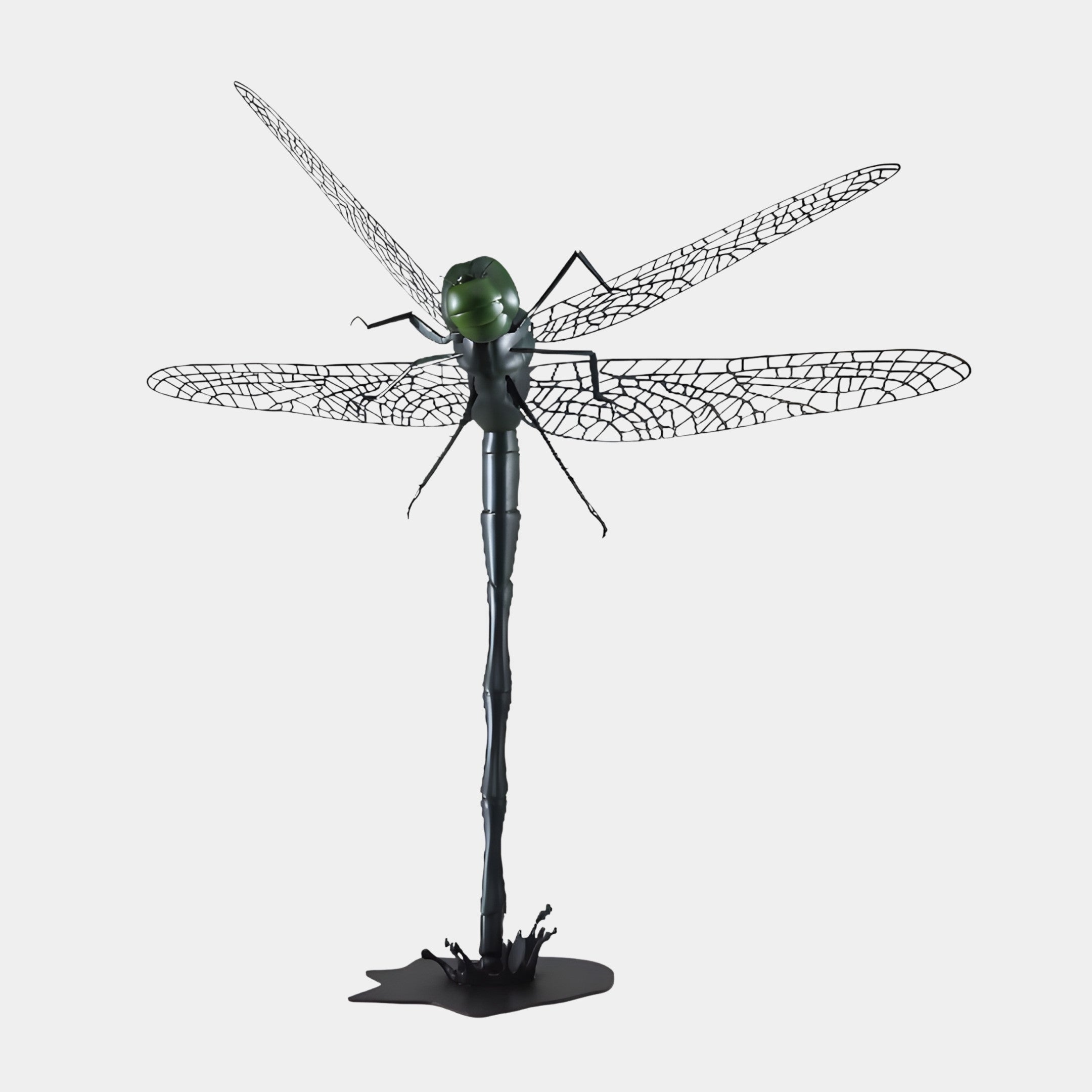 Giant Sculptures Green Metallic Dragonfly on Black Base 110cm sculpture with gunmetal body and black filigree wings on a splash base, plain background.