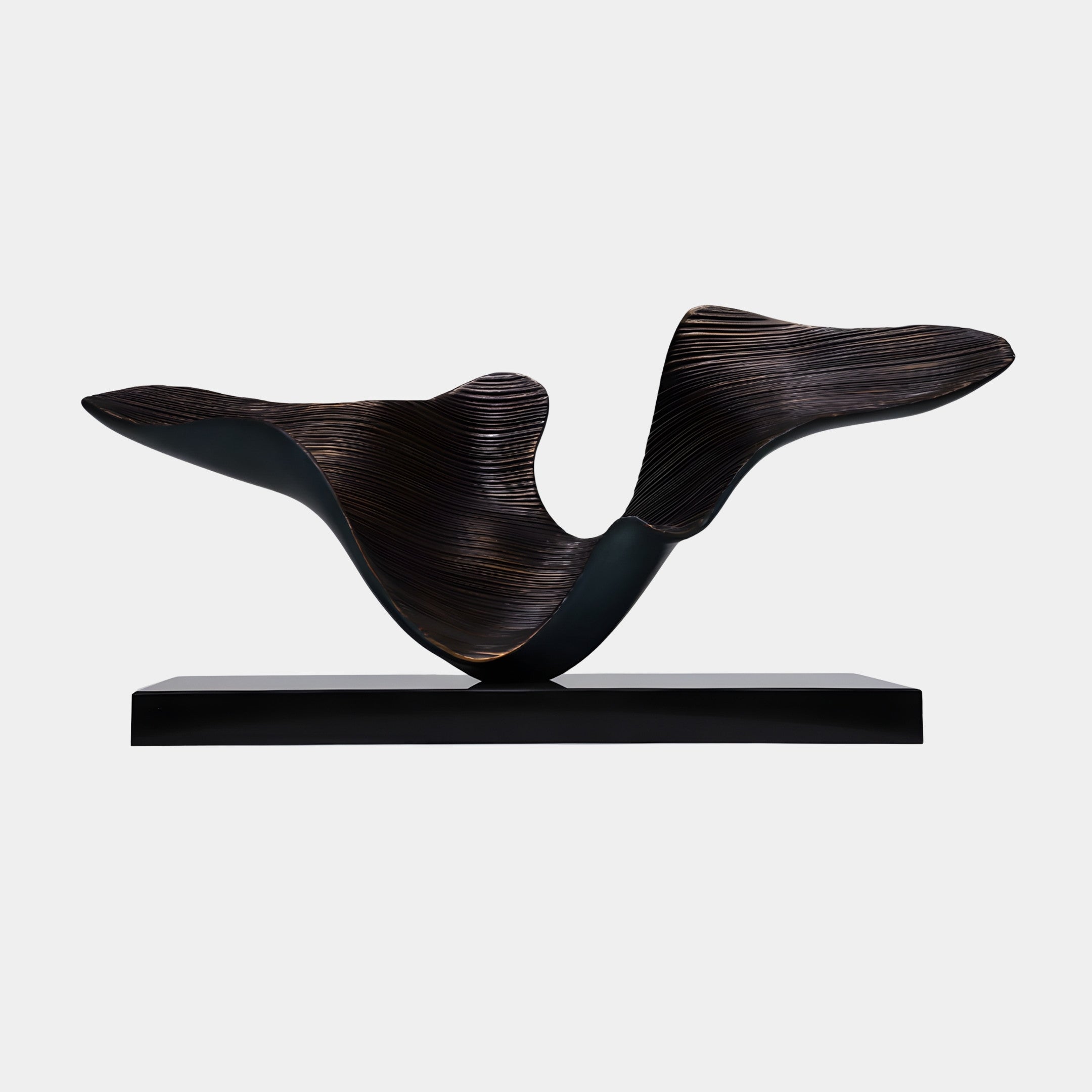 Black Abstract Soaring Bird Sculpture by Giant Sculptures, 95cm wide 3D-printed resin form with matte black exterior and ribbed bronze-brown interior on a black base.