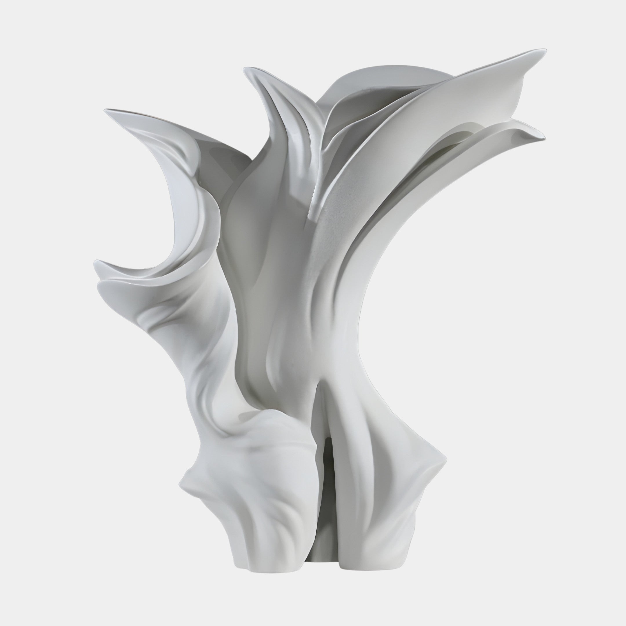 White Abstract Lily Bloom Sculpture by Giant Sculptures, 50cm matte white 3D-printed resin piece with sweeping unfurling petals, shown on a plain light background.