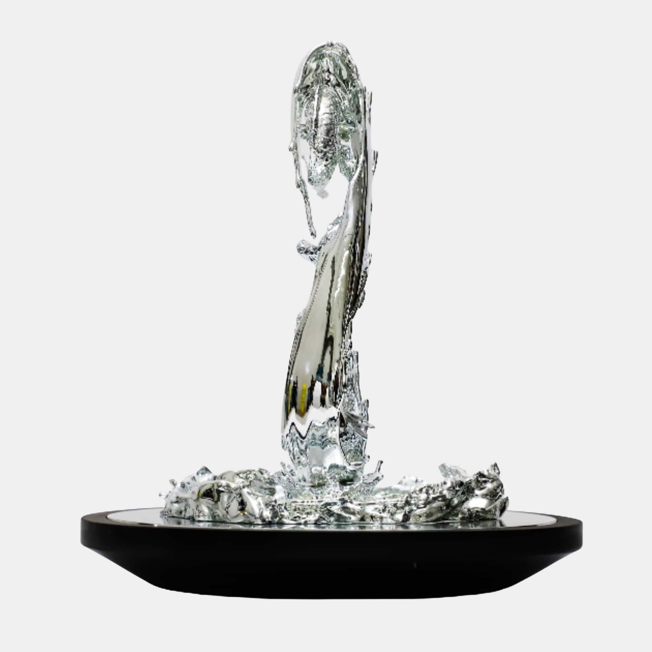 Silver Abstract Goddess in Bowl 44cm by Giant Sculptures, chrome-finish figure rising from a splash of water on a black oval base, plain background.