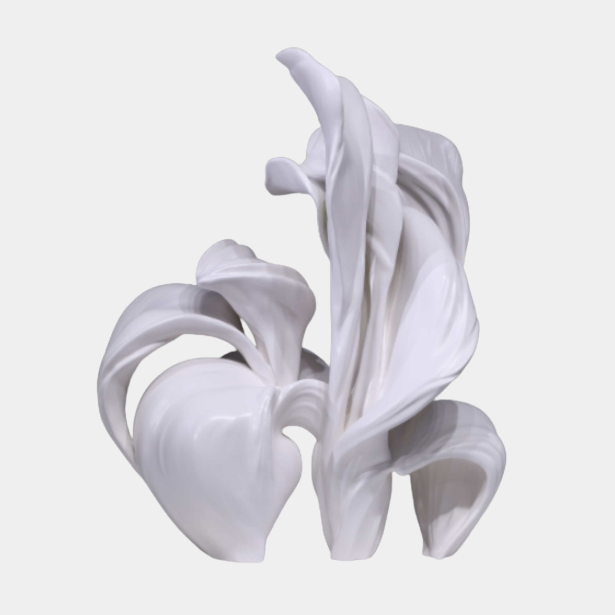 White Abstract Flowing Calla Lily Sculpture by Giant Sculptures, 60cm fibreglass piece with sweeping matte petals curling upward against a plain light background.