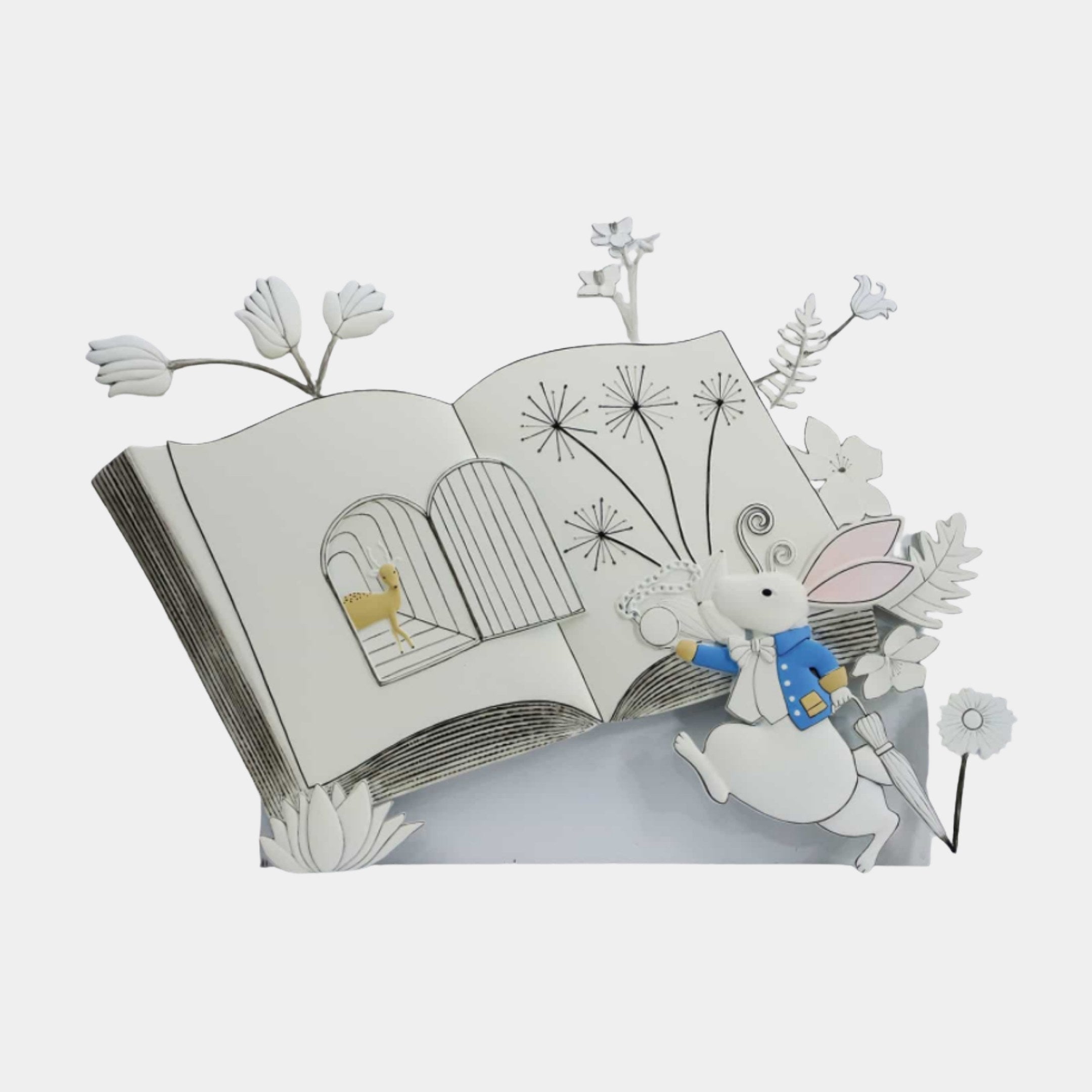 White Pop-Up Book Sculpture by Giant Sculptures, an 80cm 3D-printed resin open storybook with paper-cut flowers, dandelions, a yellow deer, and a blue-coated rabbit.