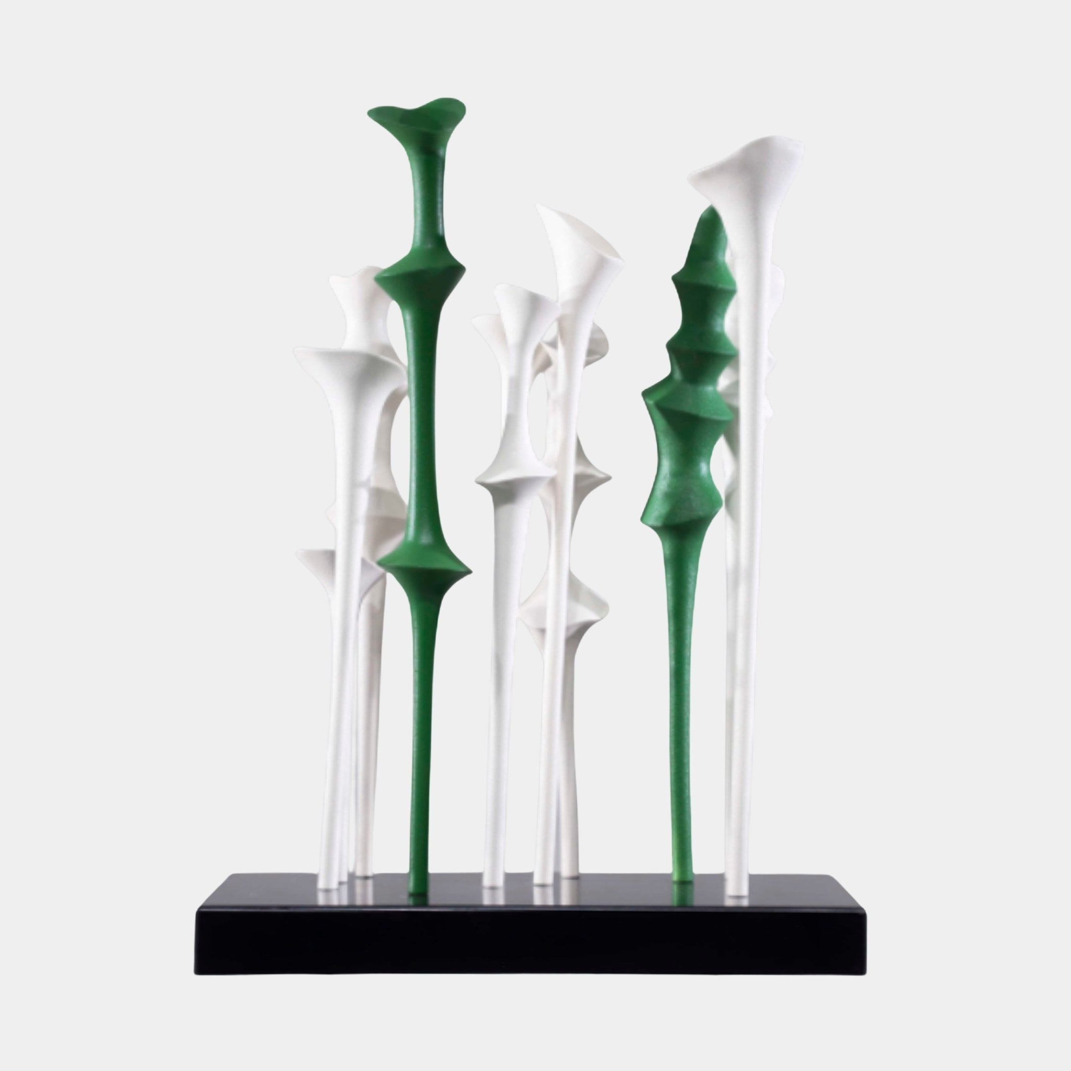 Green and White Abstract Lily Stems Sculpture by Giant Sculptures, 50cm, with tapered trumpet-tipped 3D-printed resin stems on a black base, plain background.