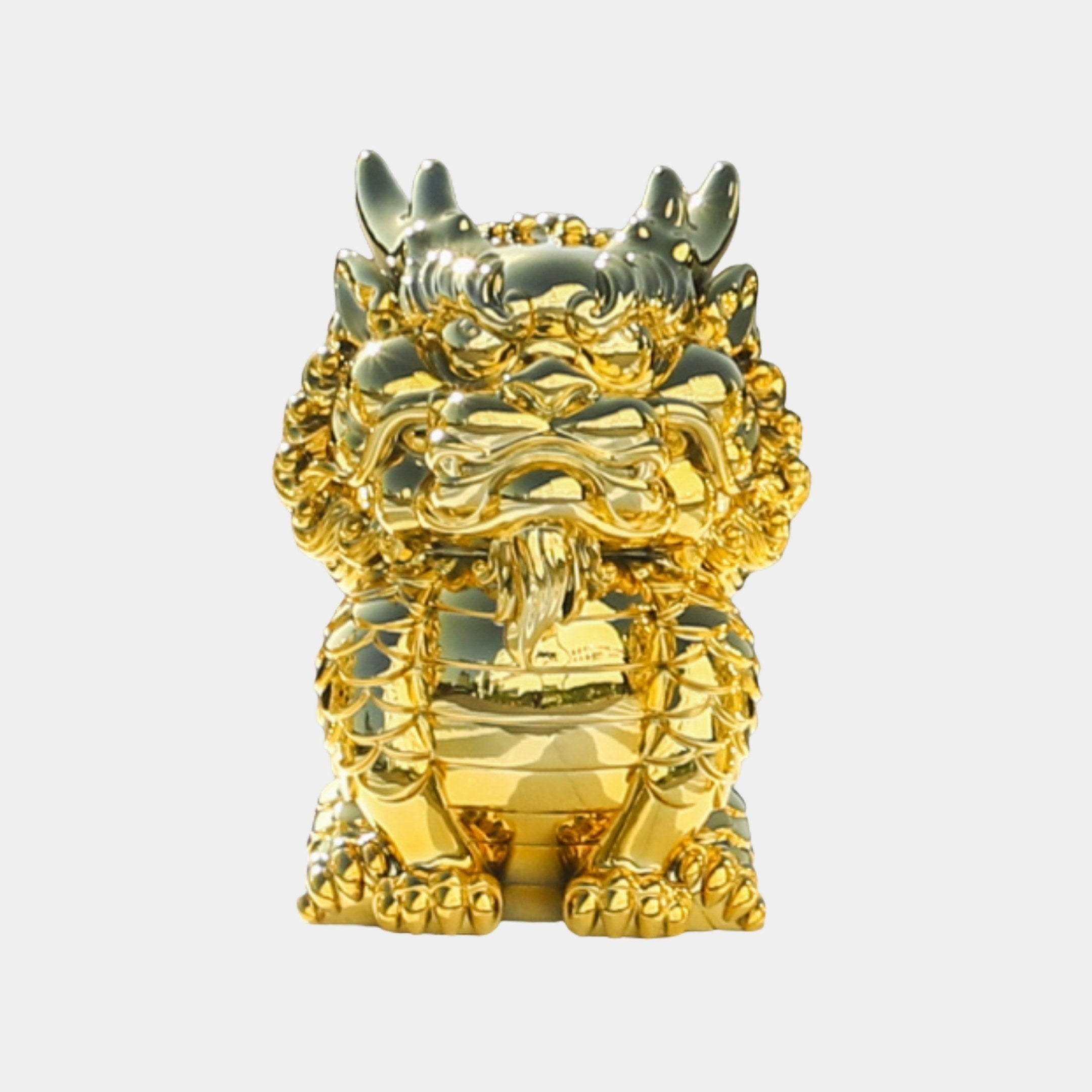Front view of the Giant Sculptures Gold Chinese Guardian Lion with dragon-like features and a curling mane in a polished gold finish on a plain background.