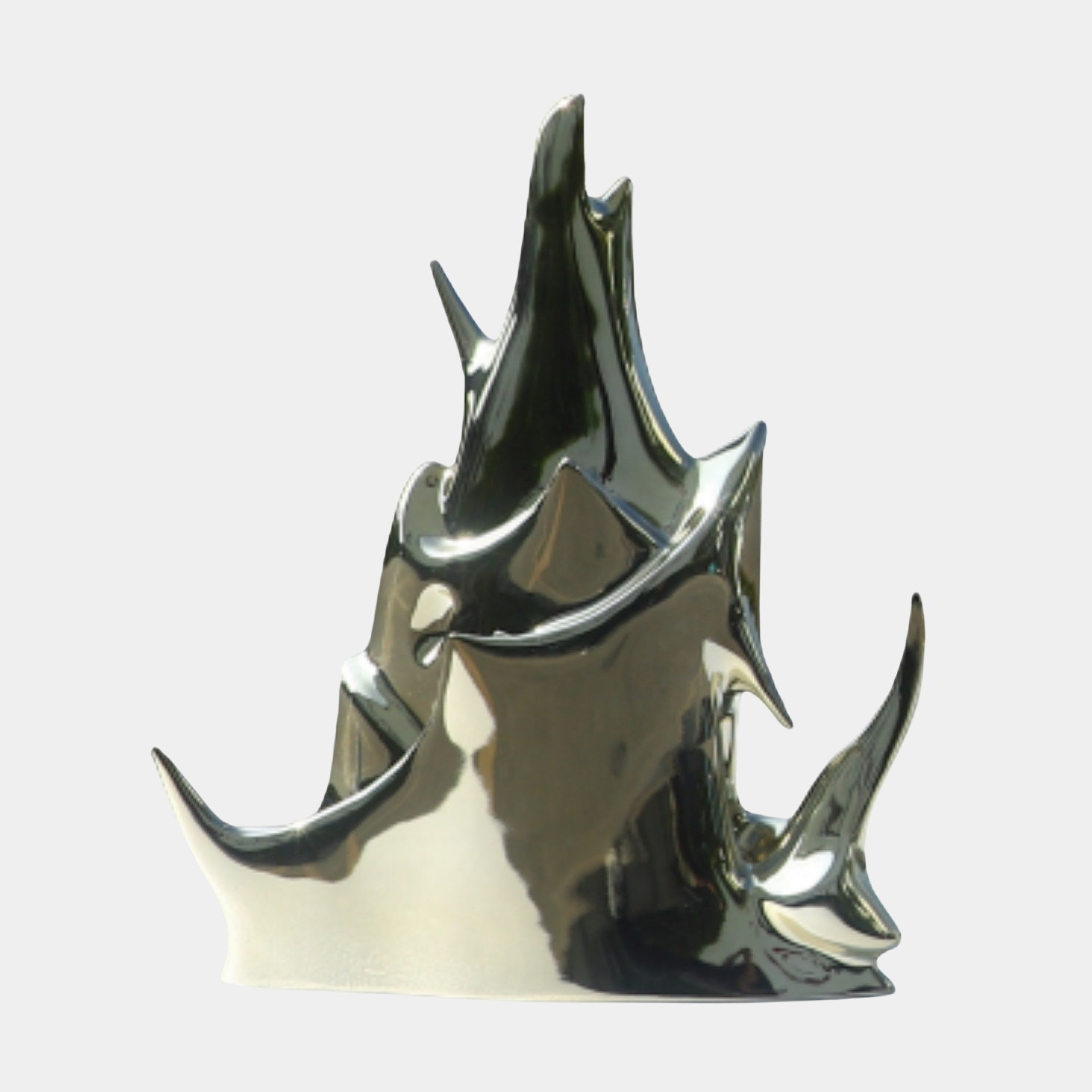 Silver Abstract Rhinoceros Pair Sculpture by Giant Sculptures in electroplated 3D-printed resin with a mirror chrome finish and sharp angular planes, on a plain background.