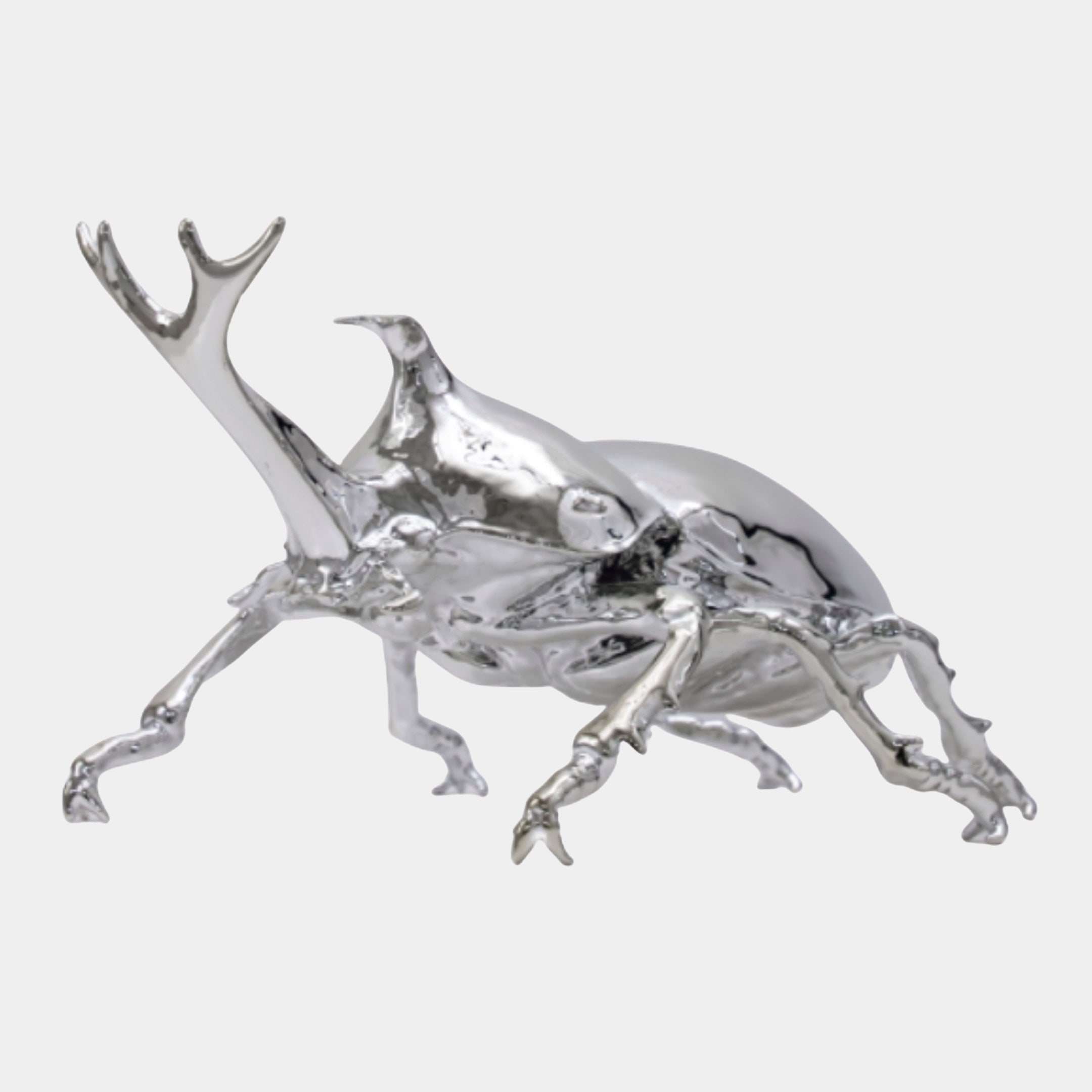 Silver Chrome Beetle Sculpture by Giant Sculptures, a 55cm mirror-finish rhinoceros beetle with raised horn and detailed legs, shown side-on against a plain background.