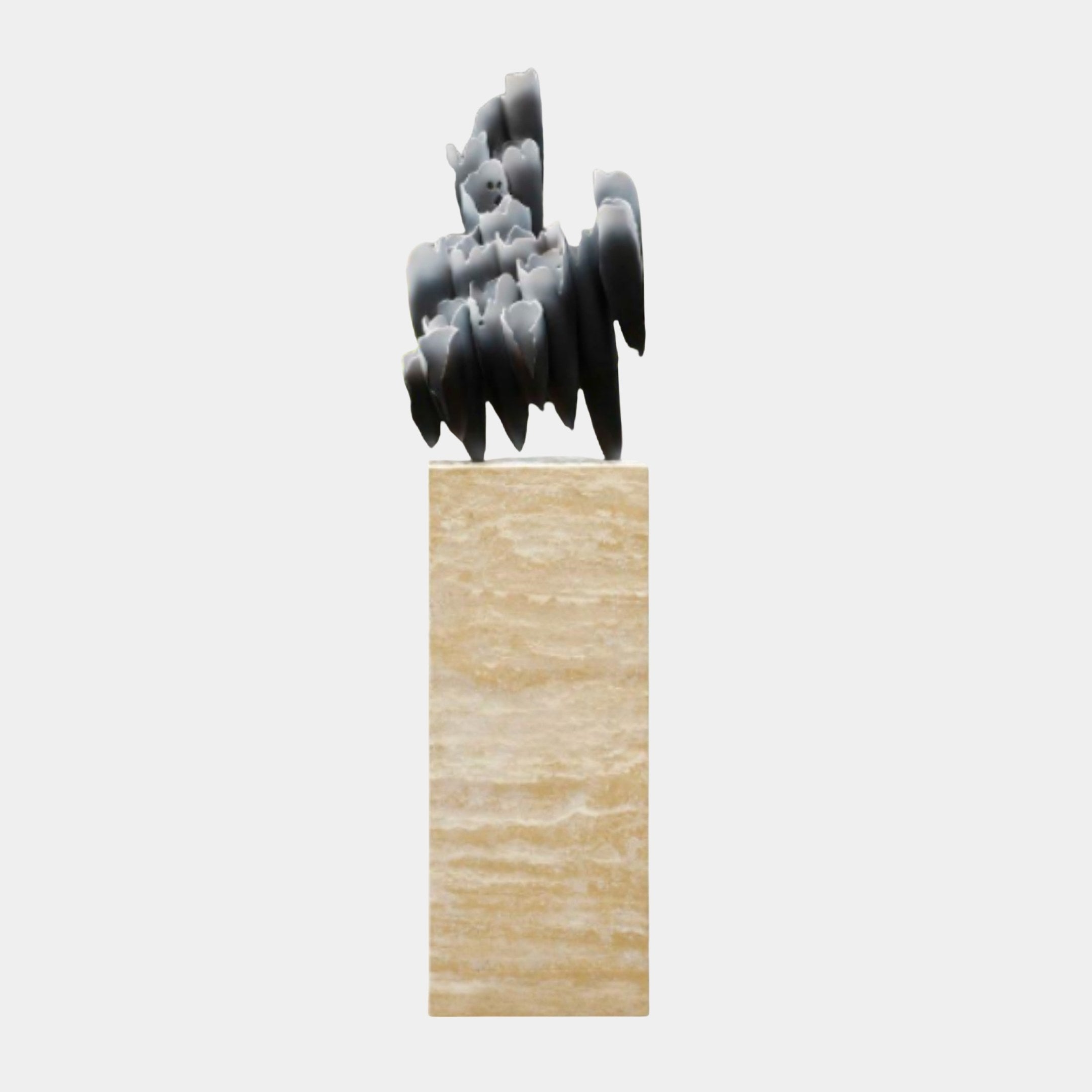 Black Abstract Horse Group Sculpture by Giant Sculptures, charcoal layered charging horses in 3D-printed resin atop a tall travertine plinth, plain background.
