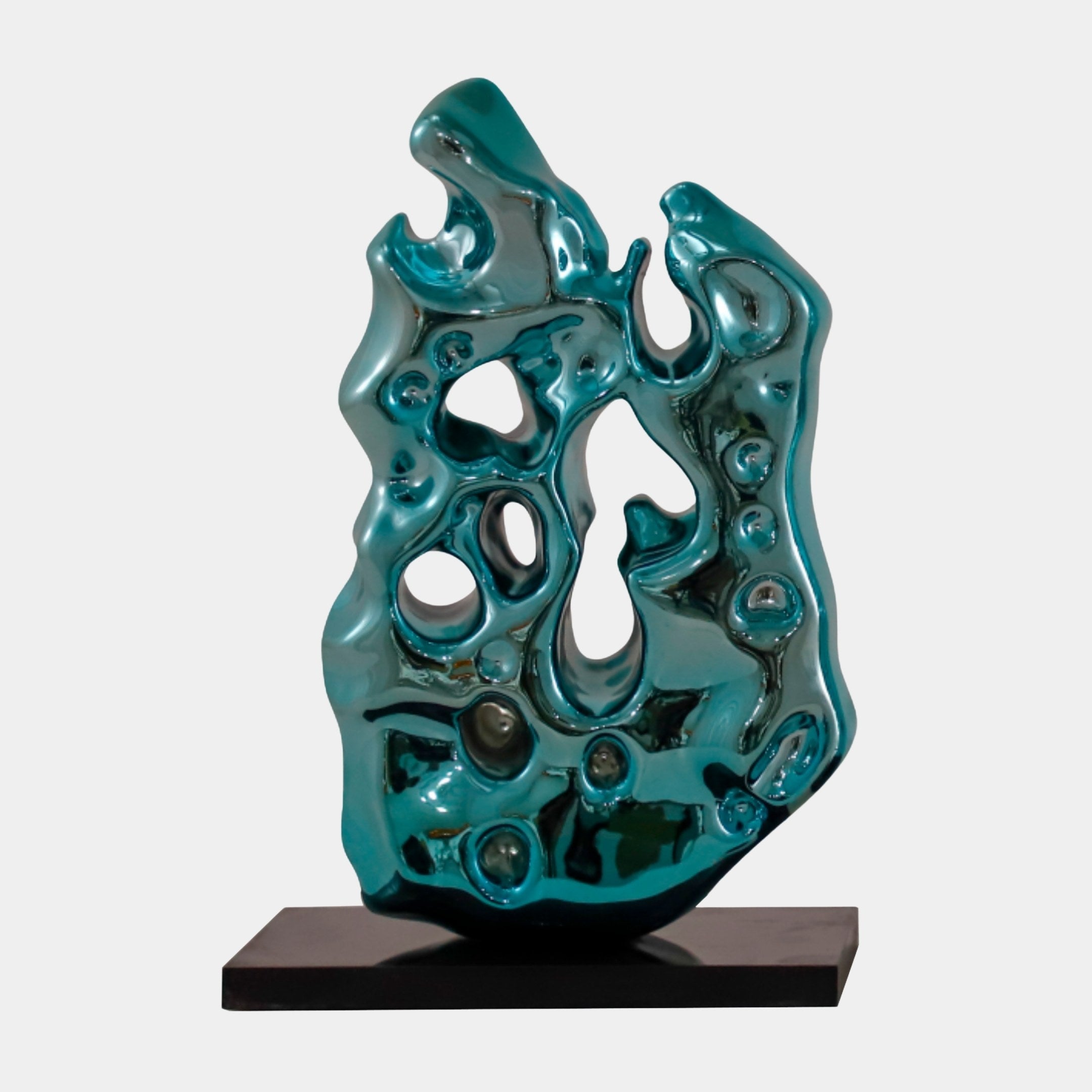 Giant Sculptures Teal Perforated Abstract Flame Sculpture 30cm in glossy metallic teal resin with organic openings and pebble textures, on a dark rectangular base.
