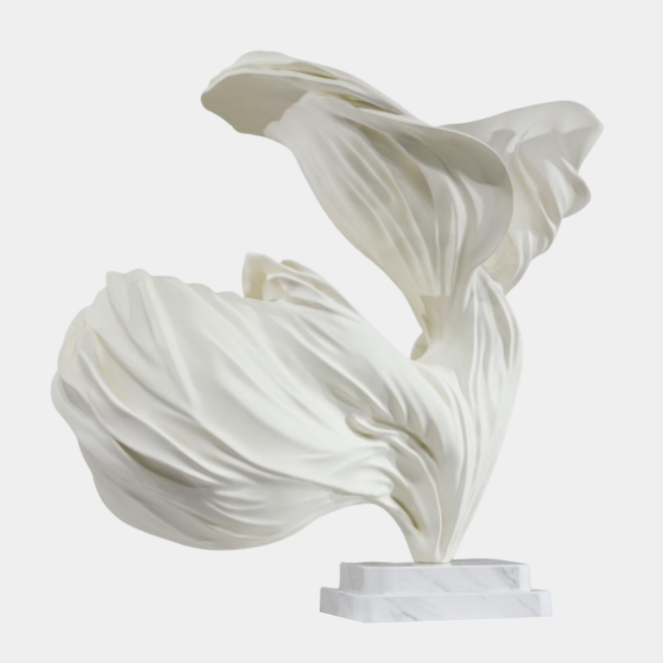 White Abstract Ruffled Bloom Sculpture by Giant Sculptures with flowing petal-like folds in matte fibreglass, set on a marble base against a plain background.
