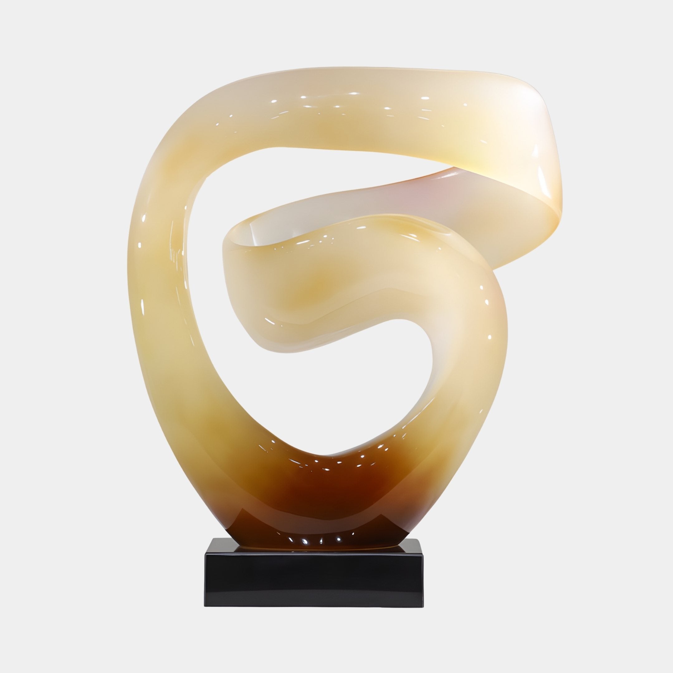 Eternal Swirl Honey Abstract Jade Sculpture by Giant Sculptures, a cream-to-amber ribbon swirl with central void on a black plinth, plain background.