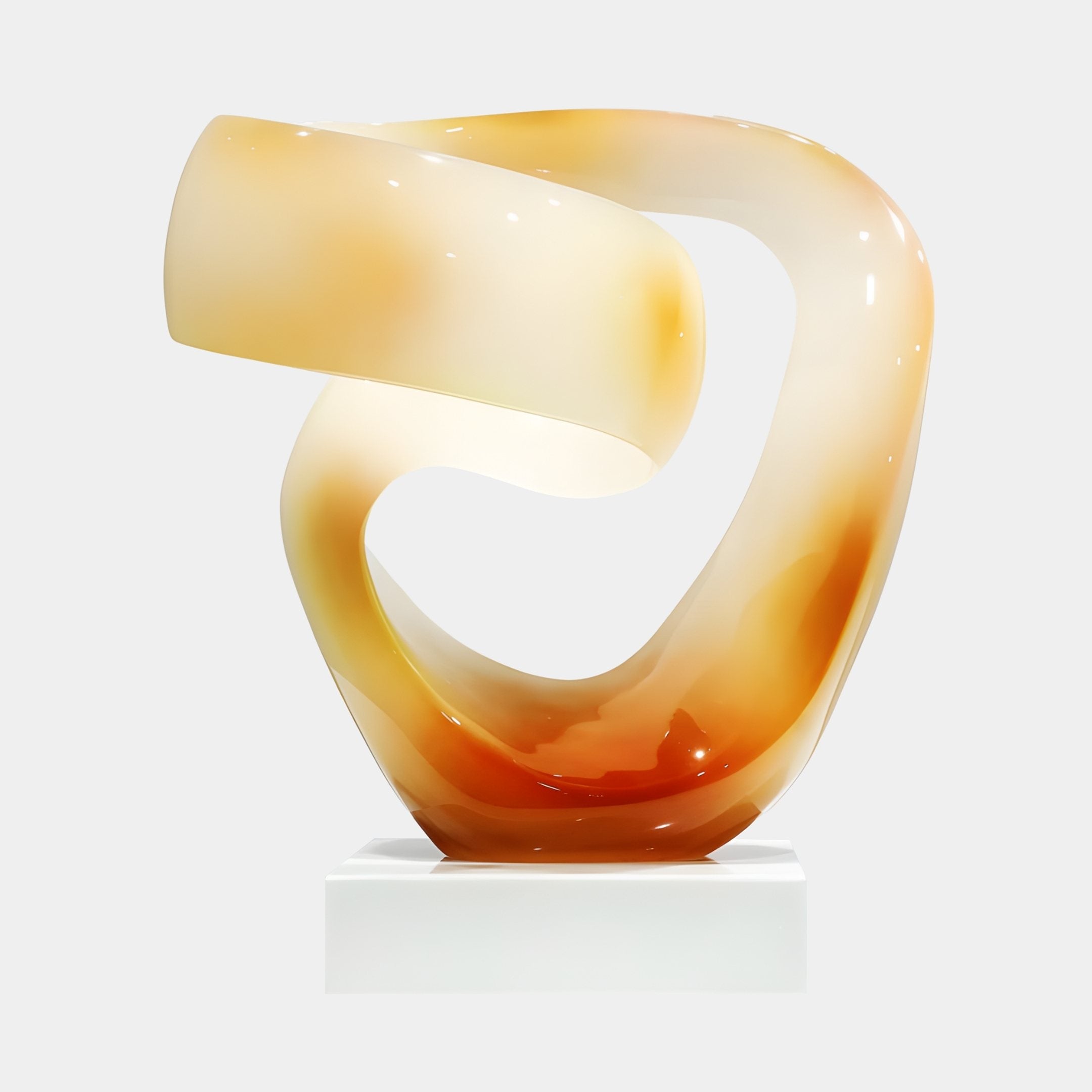 Eternal Swirl Amber Abstract Jade Sculpture by Giant Sculptures, a continuous ribbon twisting in honey and amber tones on a white base, shown against a plain background.