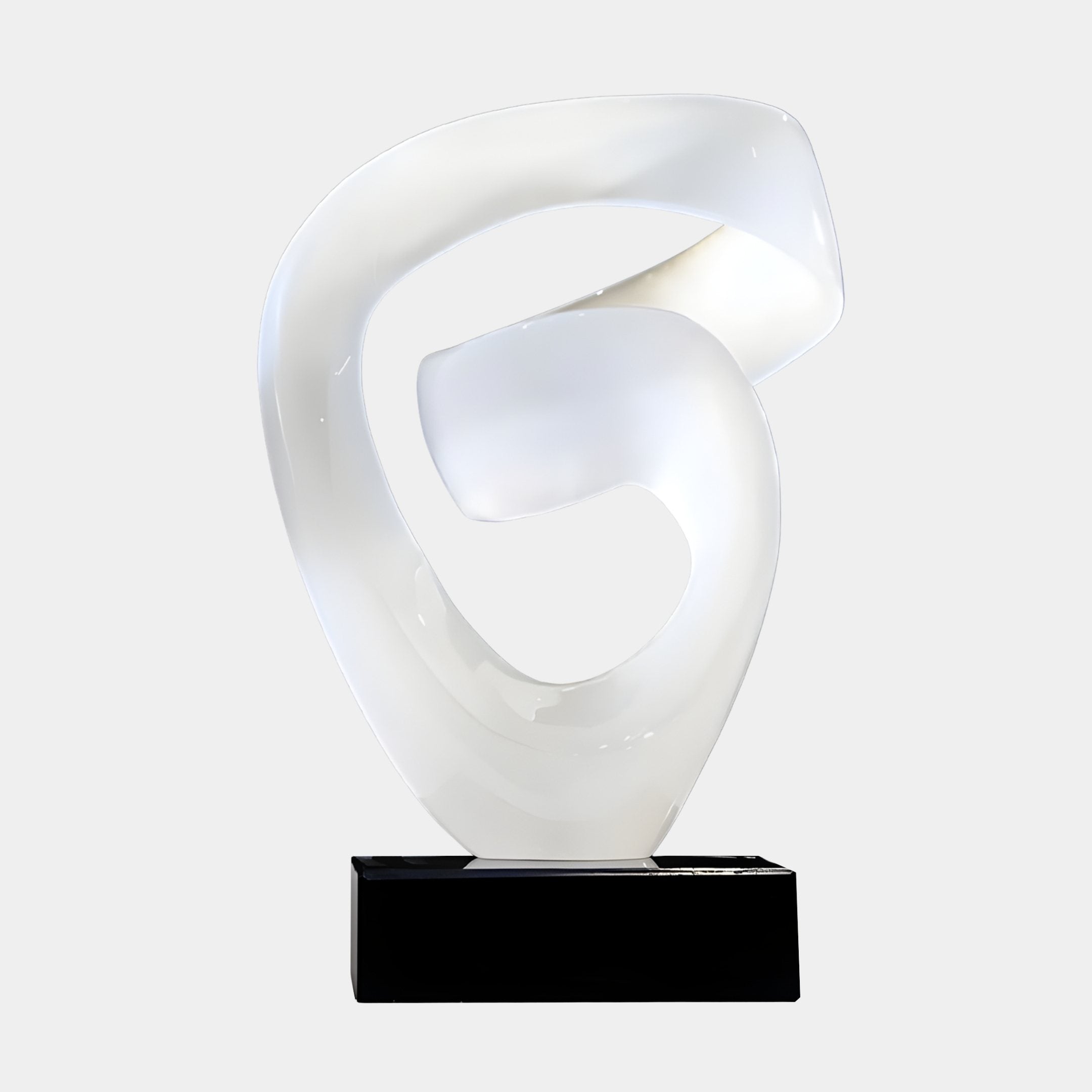 Eternal Swirl White Pearl Abstract Jade Sculpture by Giant Sculptures, a glossy pearlescent ribbon twisting through a central void on a black plinth.