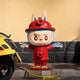 The Hidden Fire Hydrant Labubu Sculpture - 100cm by Giant Sculptures features a Pop-Art fire hydrant with bunny ears, big eyes, and outstretched arms beside a yellow scooter—showcasing expert fibreglass craftsmanship.