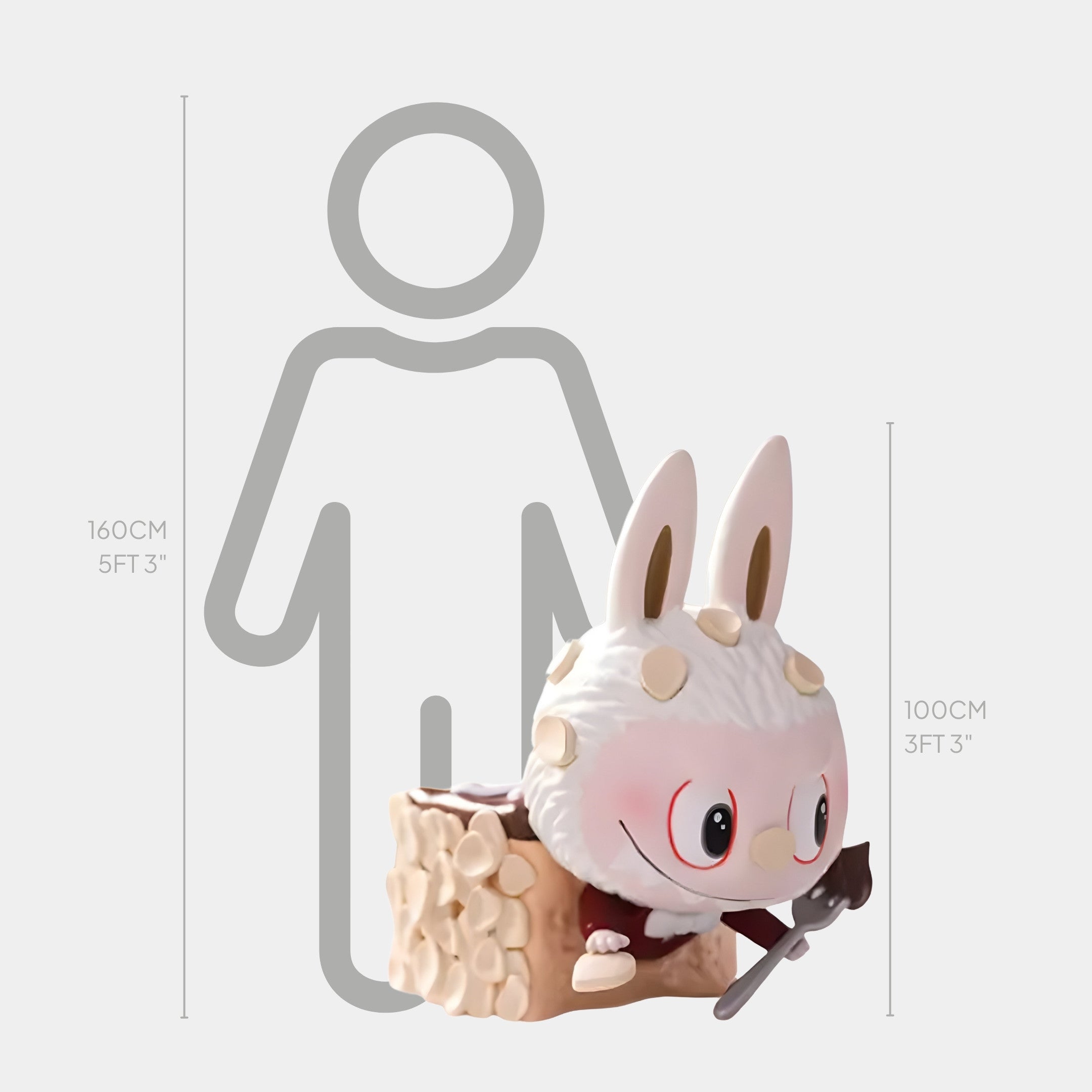The Sweet Mischief Butter Sponge Cake Labubu Sculpture (100cm) by Giant Sculptures features a small, rabbit-like figure with white fur and large ears, holding an axe beside a wooden block—perfect for whimsical interiors.
