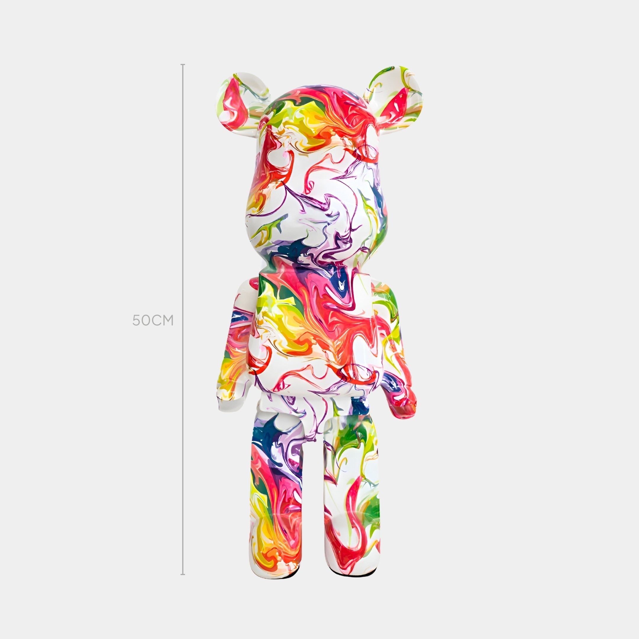 Front view of Vogue Bear Sculpture, featuring colorful abstract swirls of red, yellow, green, and blue on a white base.