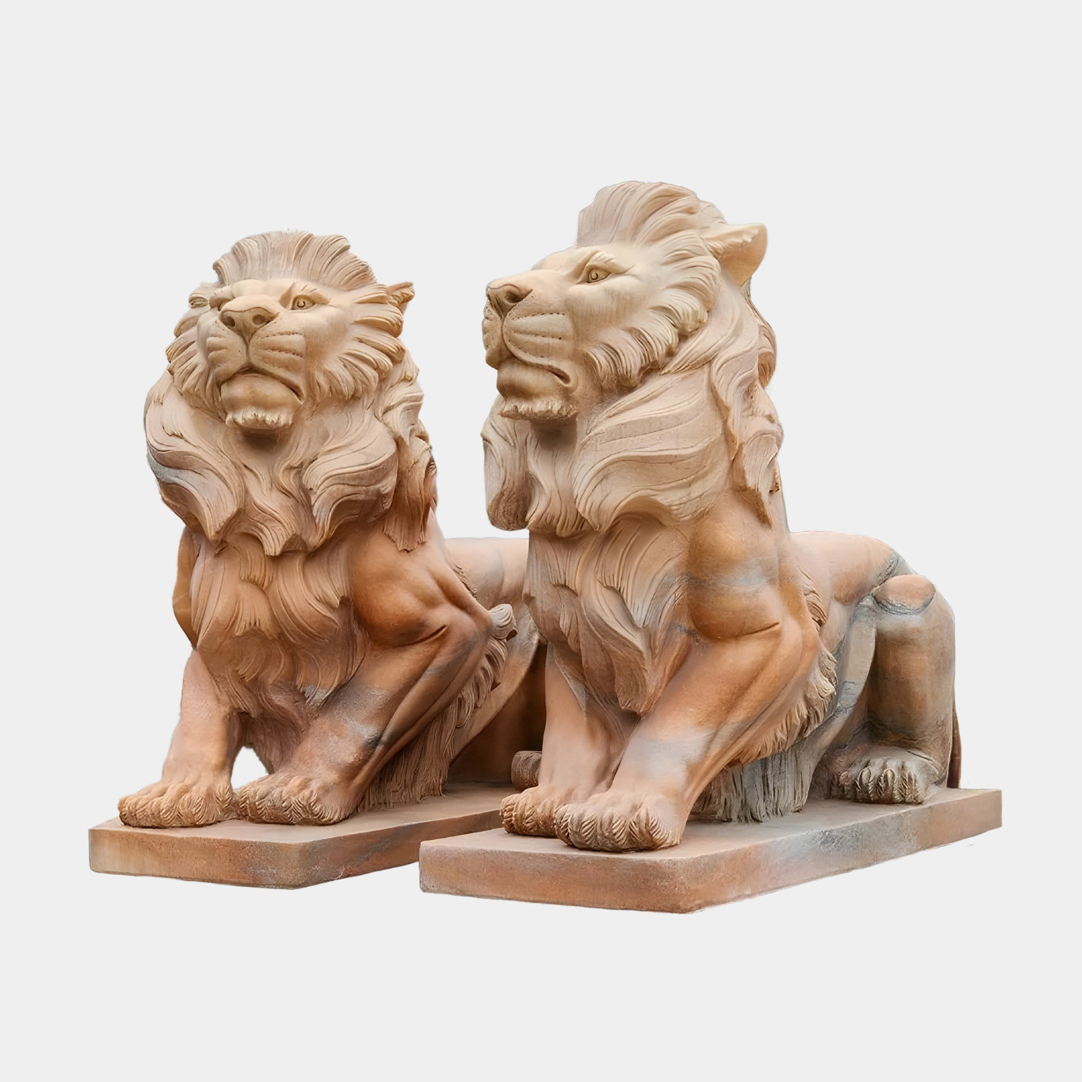 Two Giant Lion II Yellow Marble Outdoor Sculptures, each standing 180cm tall, are positioned side by side. These handcrafted pieces from Giant Sculptures depict the lions in a majestic seated posture with intricately detailed manes and strong features. The natural tones of the yellow marble enhance their textured beauty.