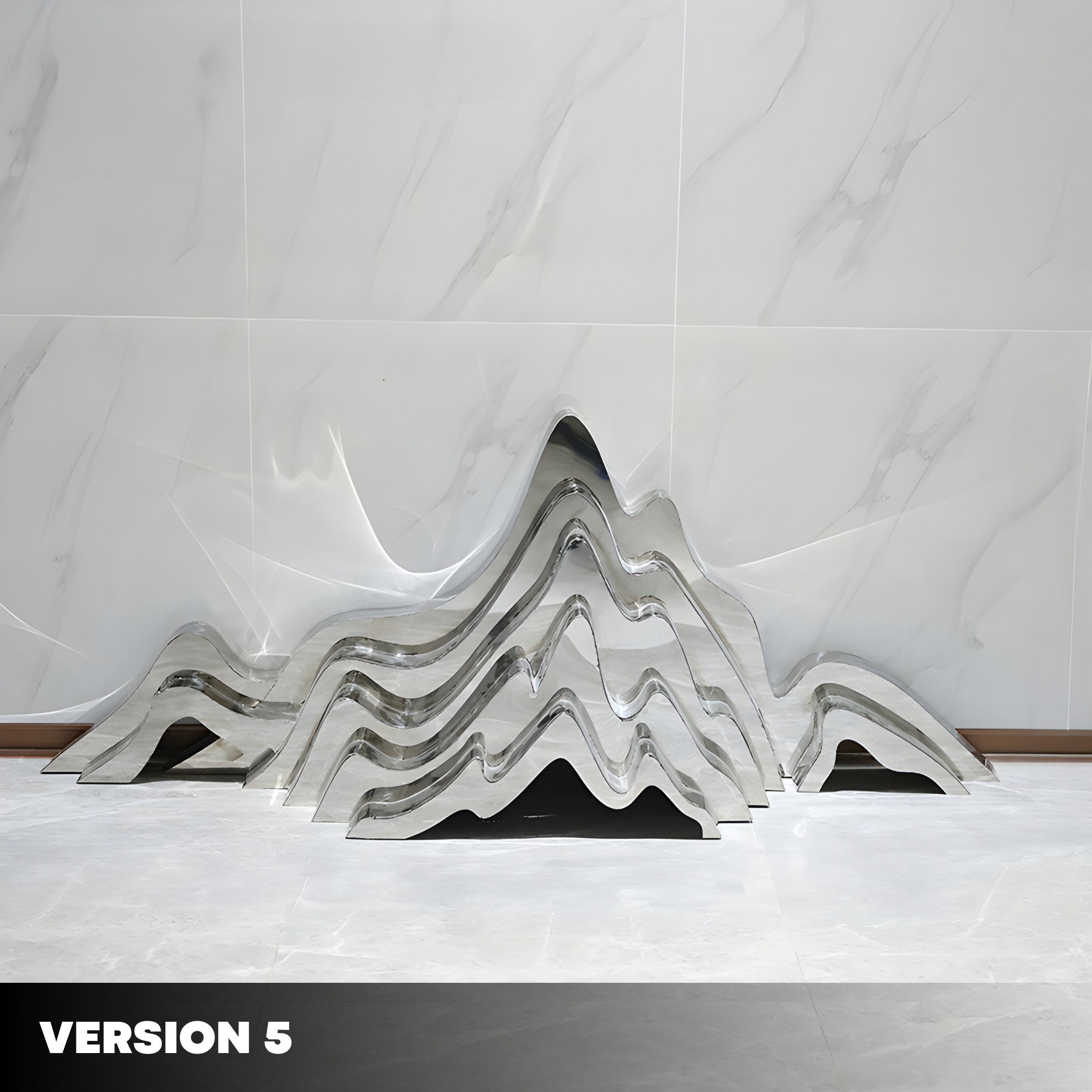 A sculpture from Giant Sculptures' Mountain Range Silver Abstract Steel collection is set against a marble wall. Its metallic surface offers distorted reflections of the surroundings. The piece is marked with the text "Version 5" at the base.