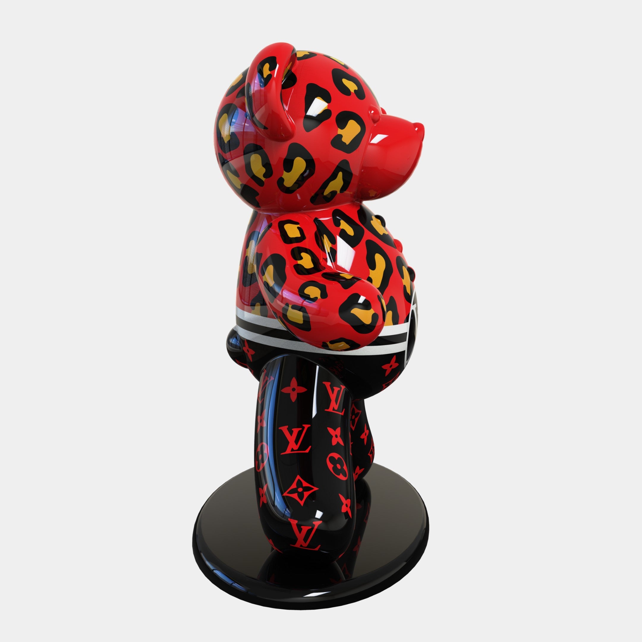 The Gacko Red Feline Bear Sculpture by Giant Sculptures features a pop art fusion of red and orange leopard print on its head, a designer logo pattern on its black lower body, and stands 165cm tall on a shiny black base.