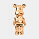 Front view of Rose Gold Bear Sculpture with reflective rose gold finish, perfect for luxury interior decor.