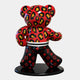 The limited edition Gacko Red Feline Bear Sculpture (165cm) by Giant Sculptures shines on a black base. Its vibrant red and black leopard print body radiates pop art style, with legs featuring a striking black backdrop embellished with red and pink patterned logos.