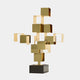 Golden cube-like sculpture with stacked blocks, forming a cross-shaped design.