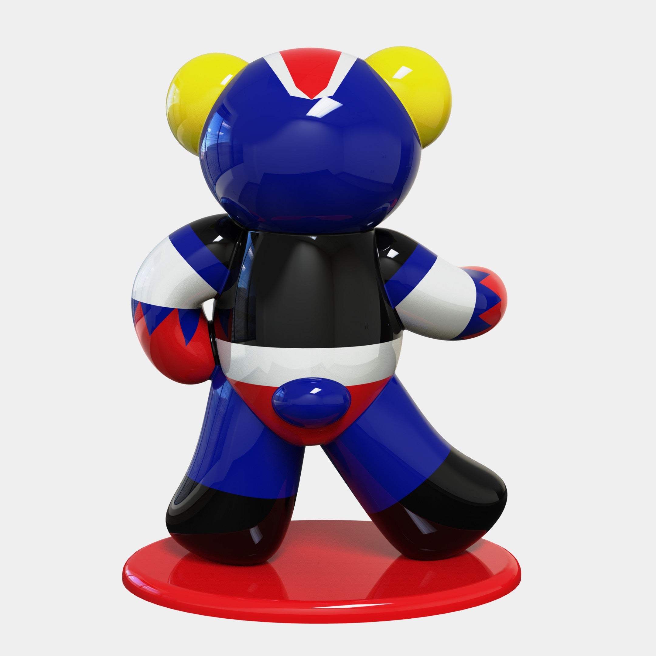 The Gacko Goldorak Bear Sculpture by Giant Sculptures features a glossy, bear-shaped form with blue, black, red, white, and yellow hues on a red circular base. Standing 165cm tall in retro anime style, its bold geometric design shows the bear facing away with one arm raised.