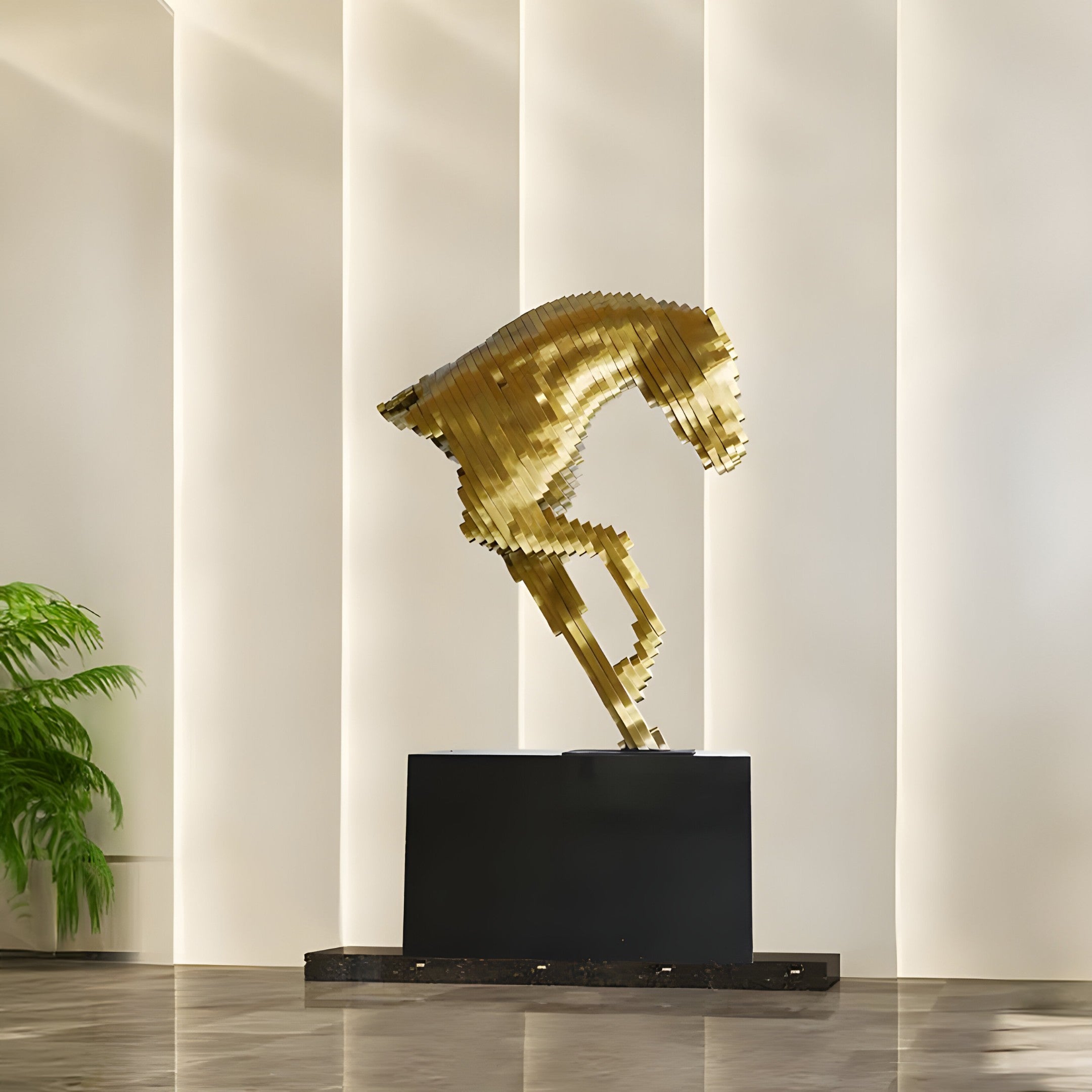 Gold stainless steel horse sculpture with dynamic, abstract lines, reflecting contemporary design in an indoor luxury setting.